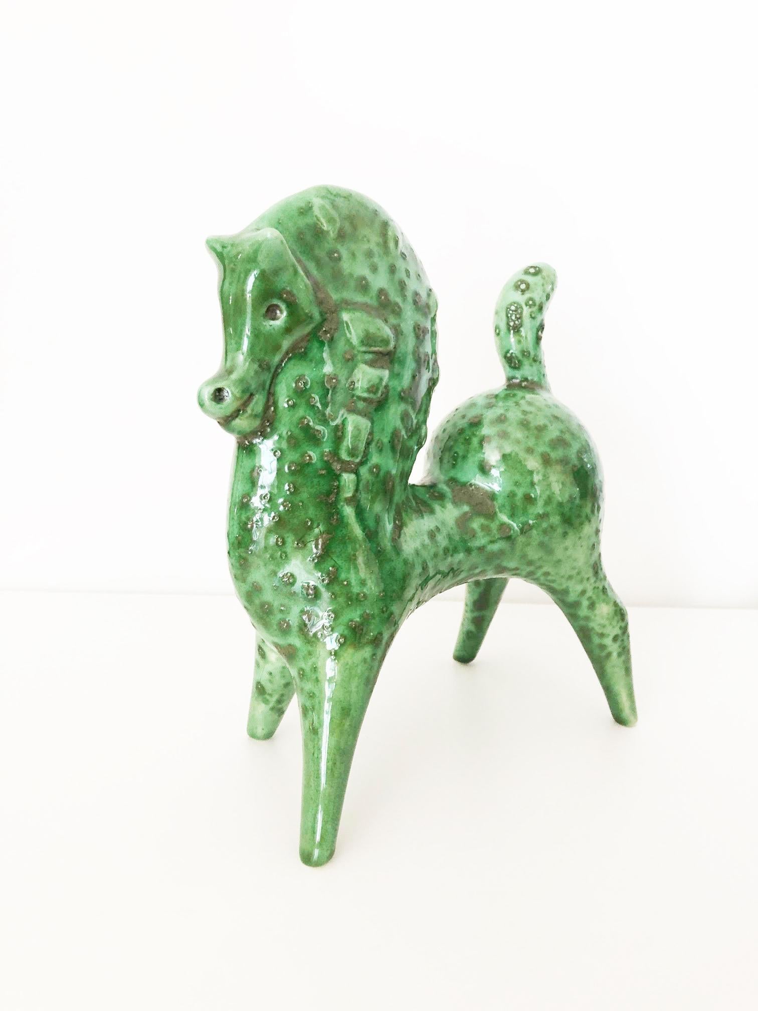 Pferdepferd von Roberto Rigon, hergestellt in Italien – Kunst –

Jahr: 1950

Materialien: signierte und glasierte Keramik, grün

Bedingungen: Perfekt

Abmessungen: ca. 30 x cm 20

