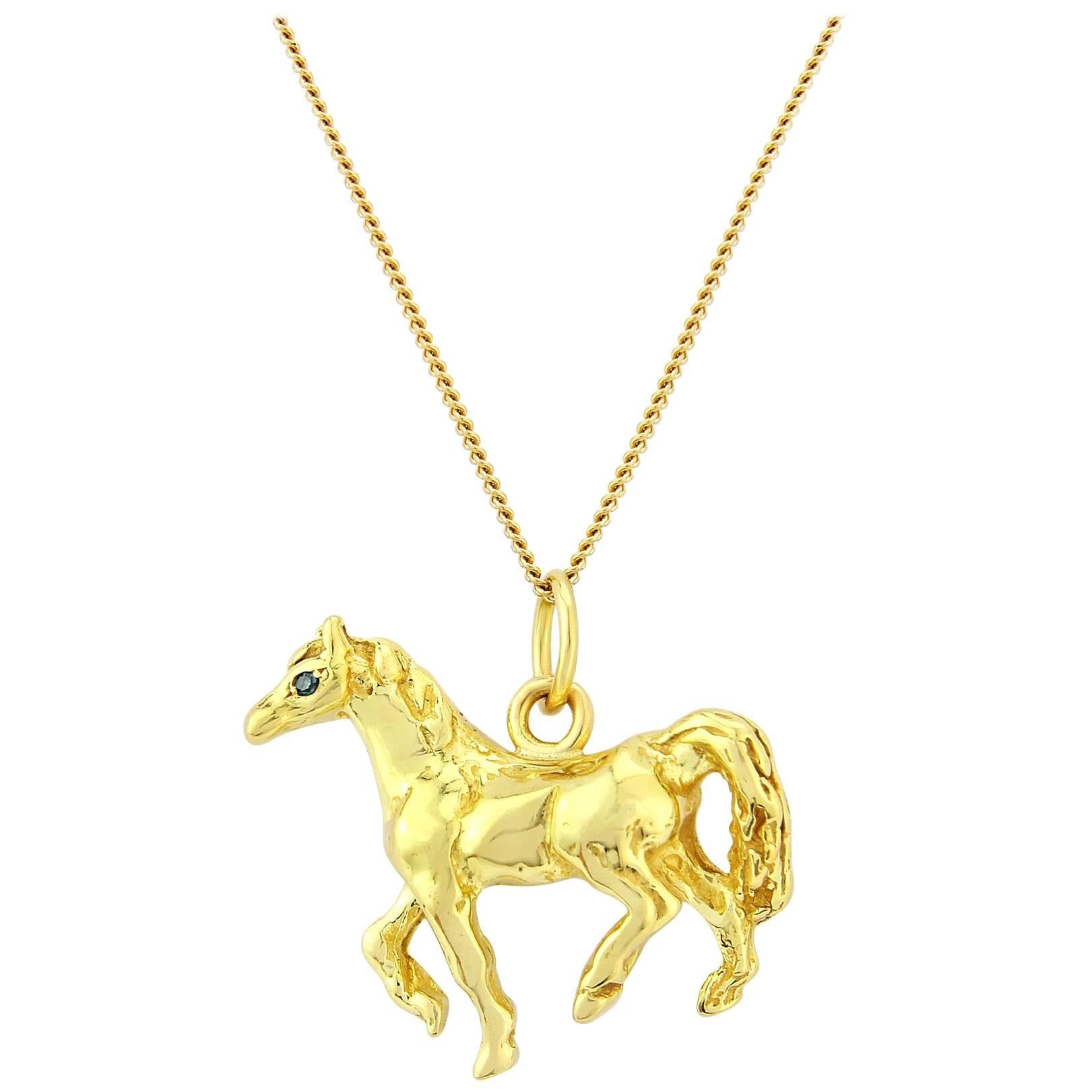 Horse Pendant in Solid 18 Karat Gold with Emerald Eyes For Sale