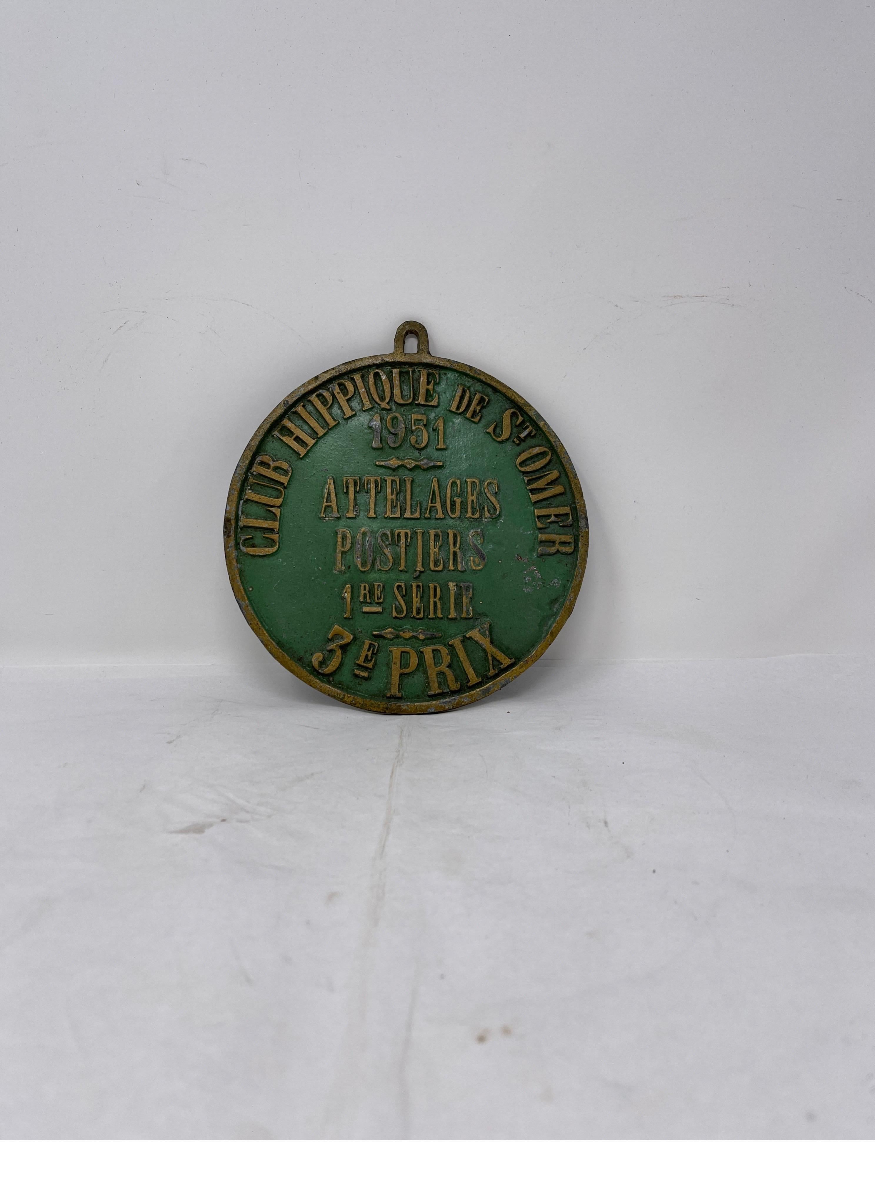 This metal horse show 1951 trophy was for Harness racing. This the regal green trophy embossed with brass trim and lettering would look awesome on any study wall or used as a decorative element in a bookshelf.



Measures: 6 1/2