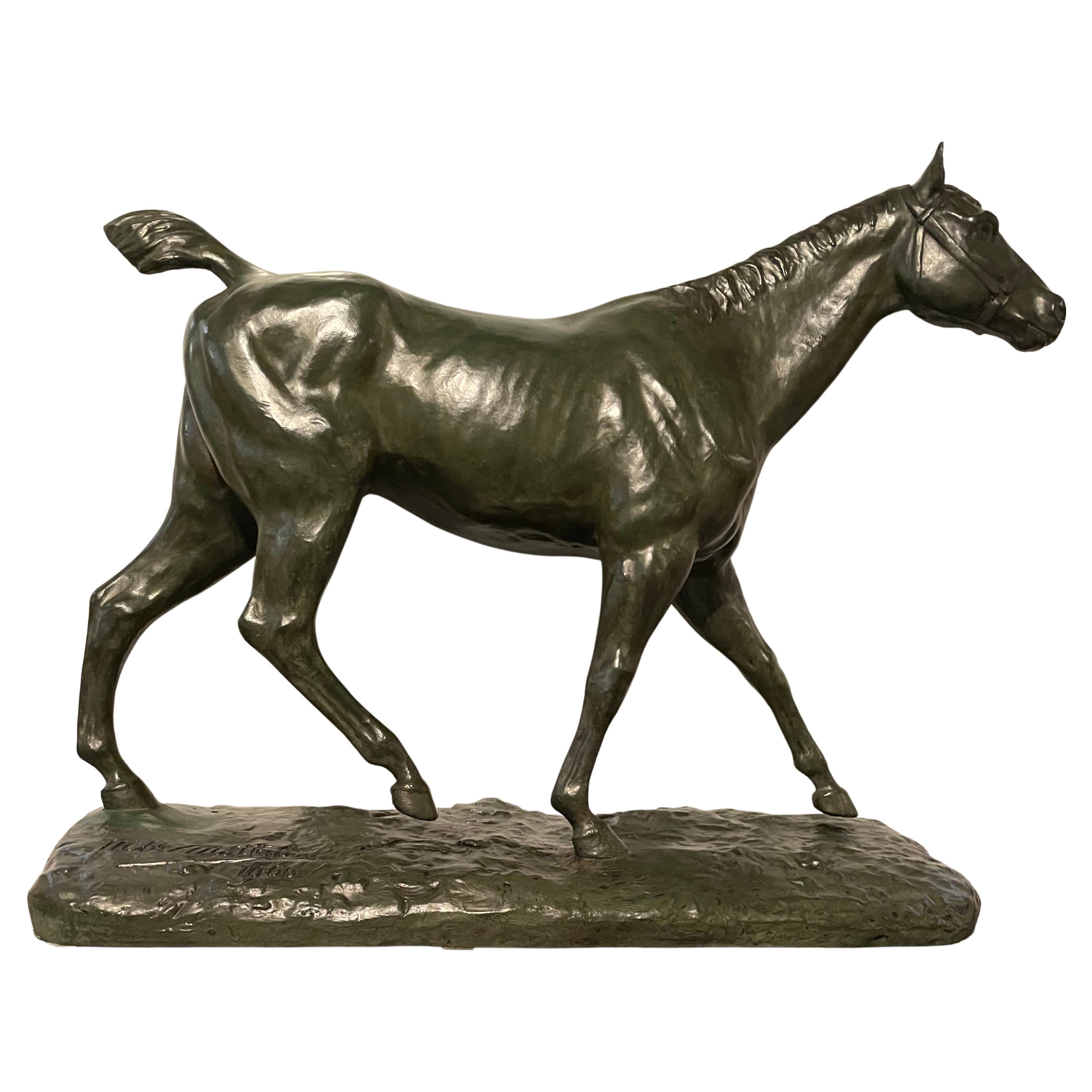 Horse walking in bronze with green patina. Signed on the base M.de Mathelin 1900 For Sale