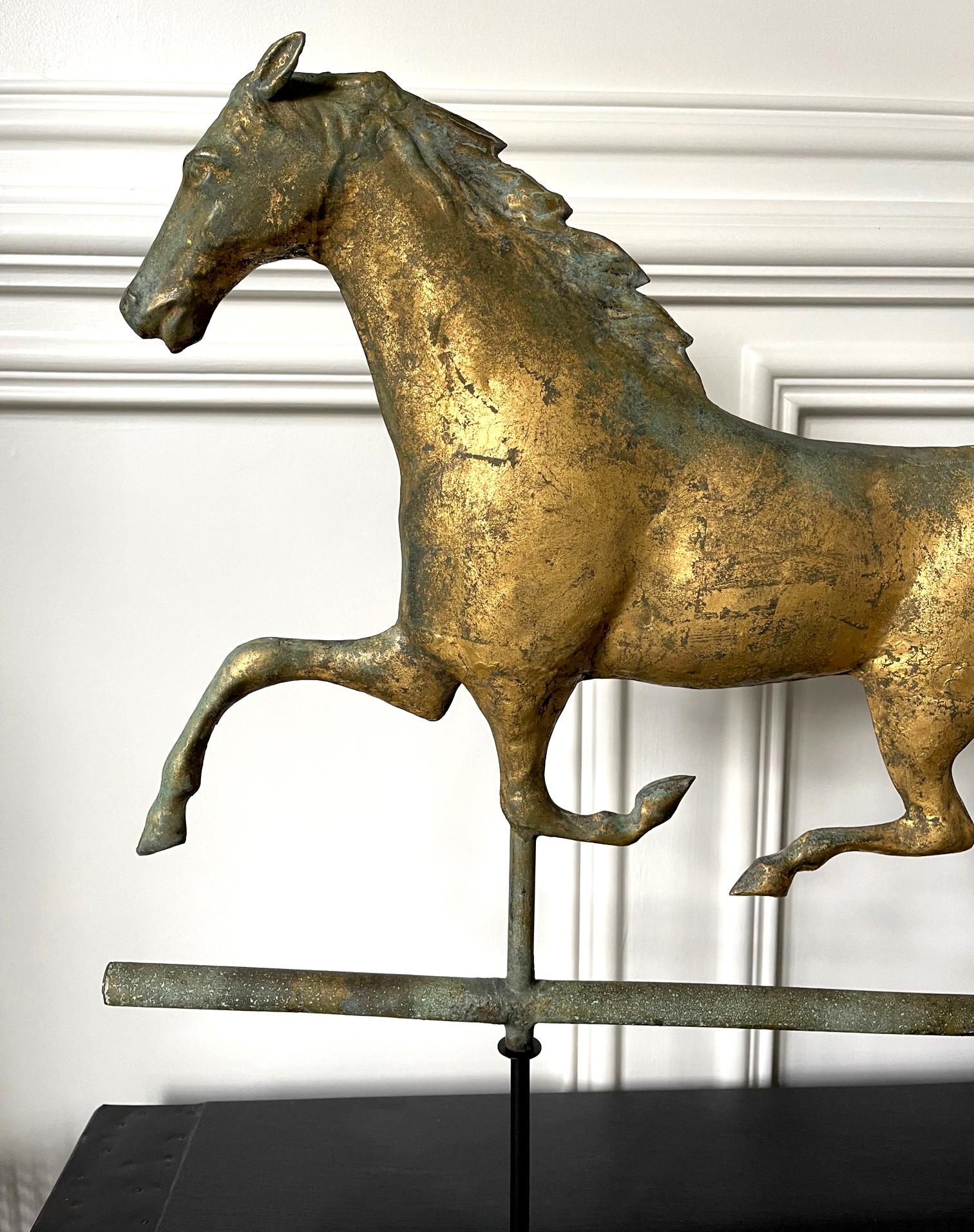 antique horse weathervane on stand