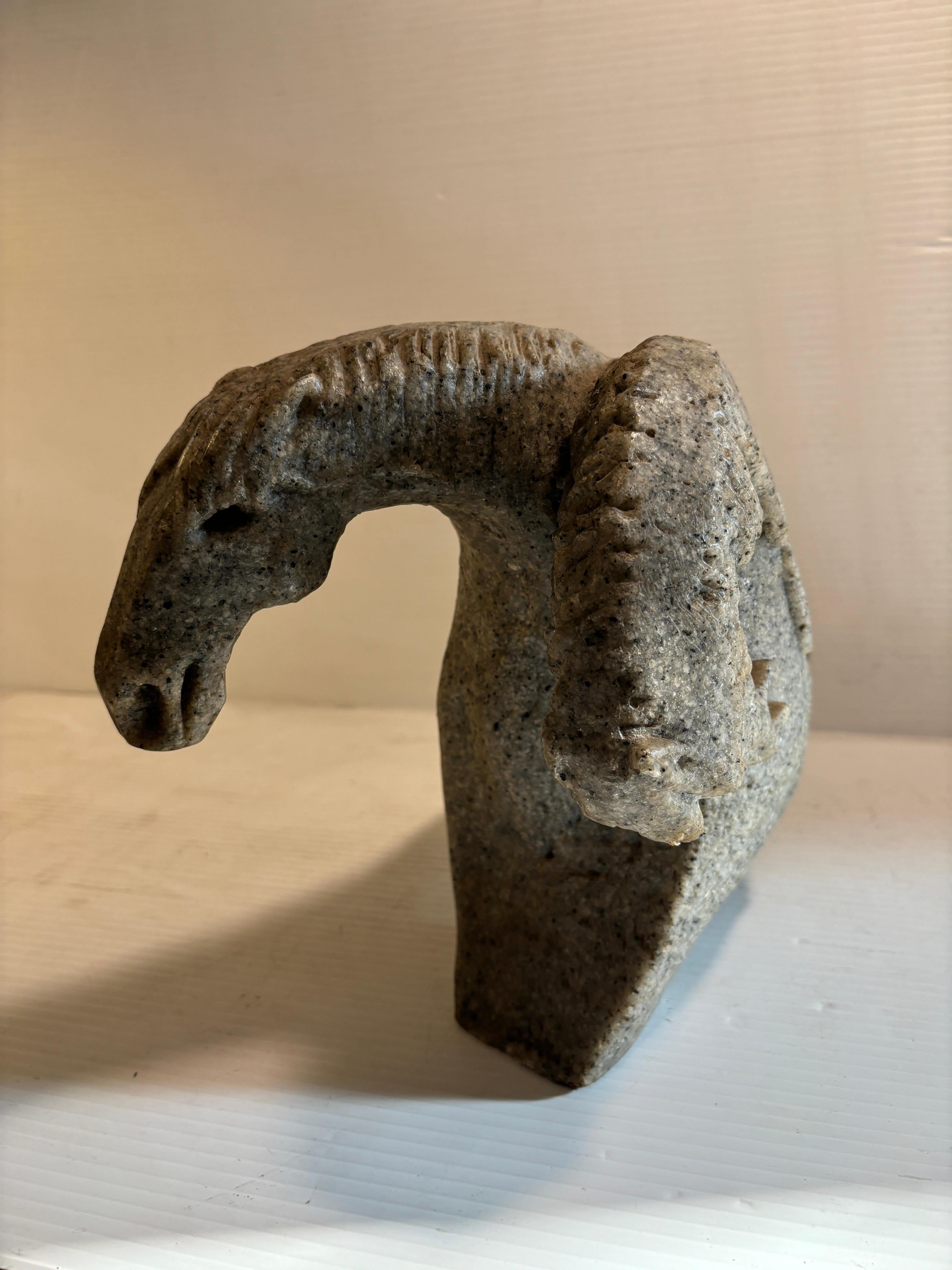 Add fine 20th century art into any space with this exquisite statue of a two-headed horse. Created by Vietnamese-French artist, Hoi Lebadang (1922-2015), it is at once surreal and organic, with it's fantastical biomorphic shape and robust stone