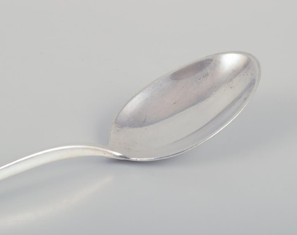 Danois A. Silver. Un ensemble de neuf cuillères à manger en argent 830. en vente