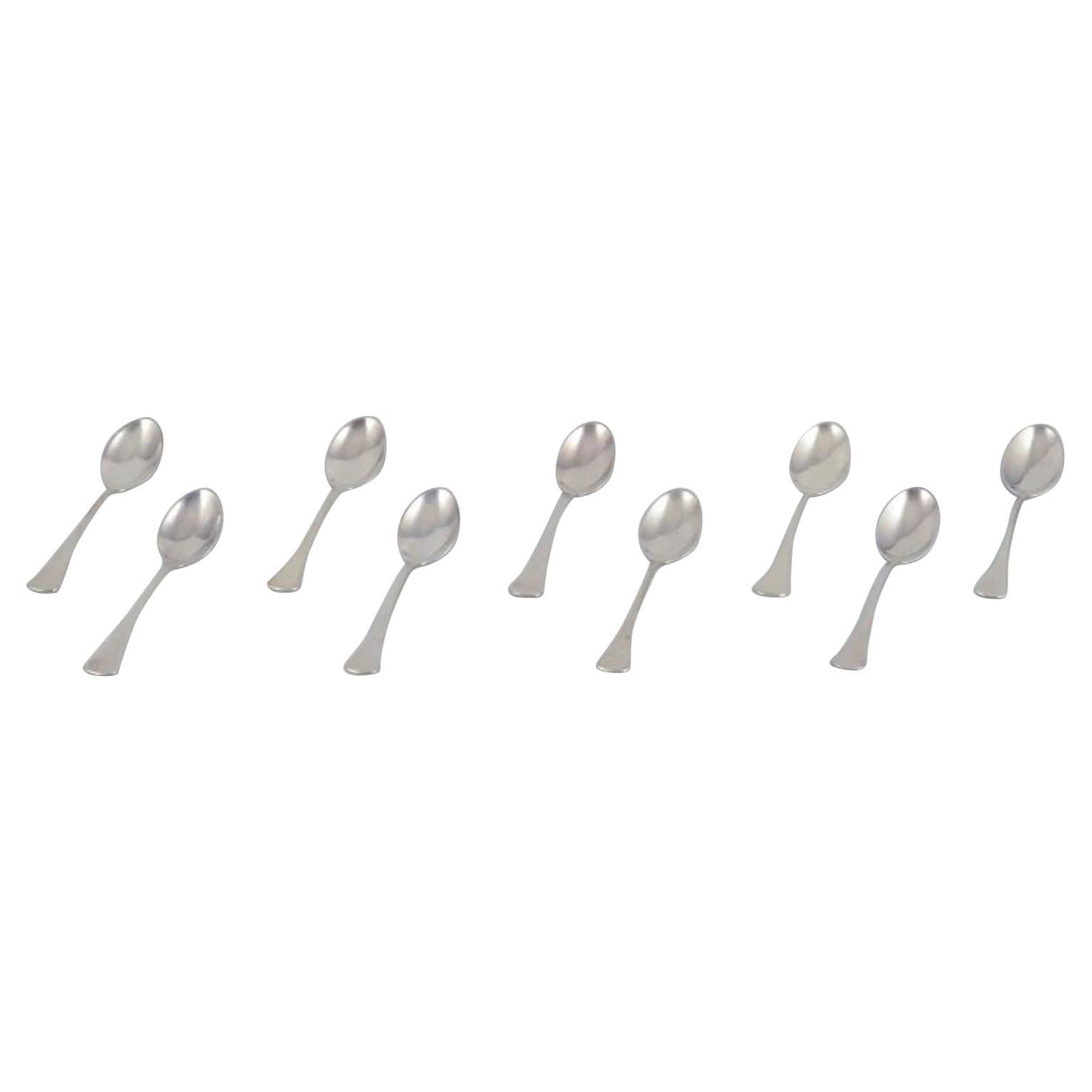 Horsens Silver. A set of nine dining spoons in 830 silver.