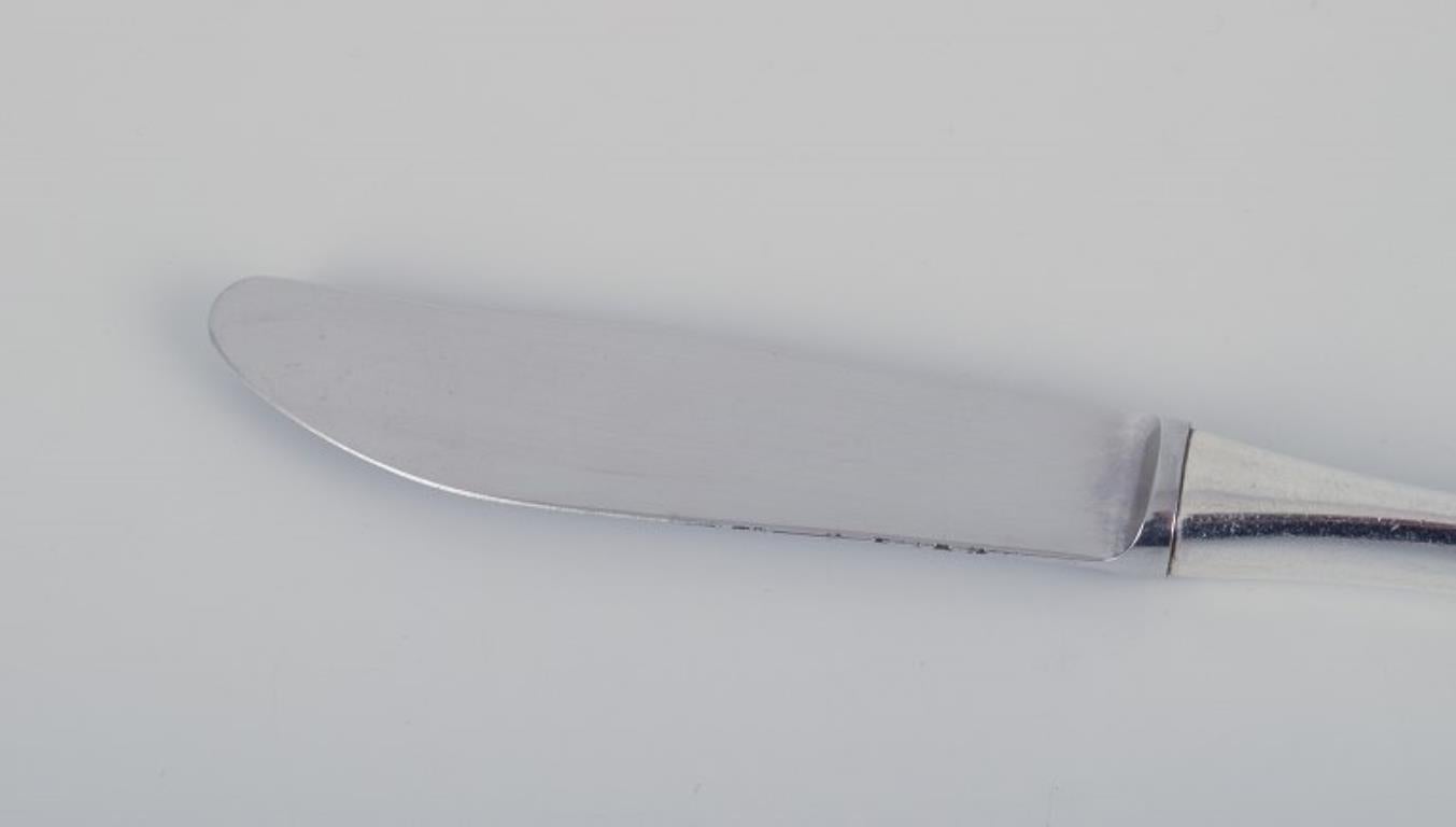 Scandinavian Modern Horsens Silver. A set of ten knives in 830 silver with stainless steel blades. For Sale