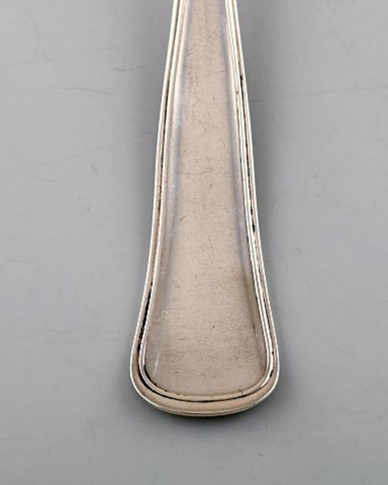 Horsens Silver (Denmark). Old Danish dinner fork in silver, 1950s.
In very good condition.
Stamped.
Measures: 21 cm.
6 pieces in stock.
