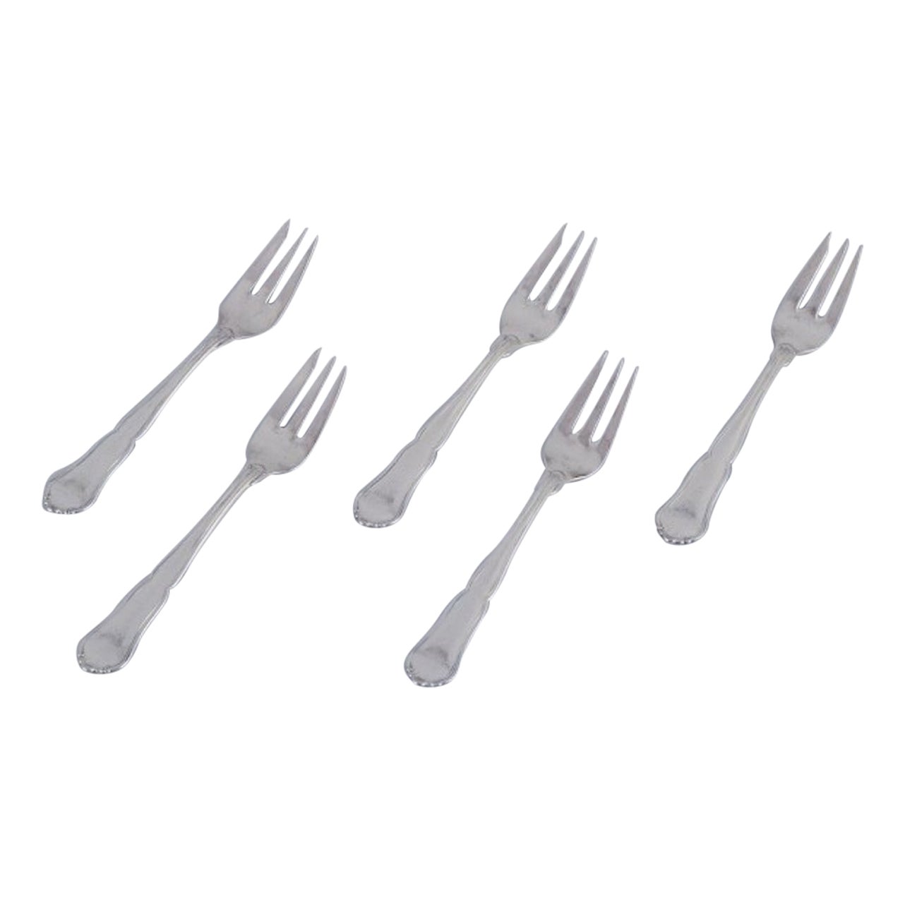 A. Silver. Ensemble de cinq fourchettes à gâteau en argent 830. Dans les années 1930.