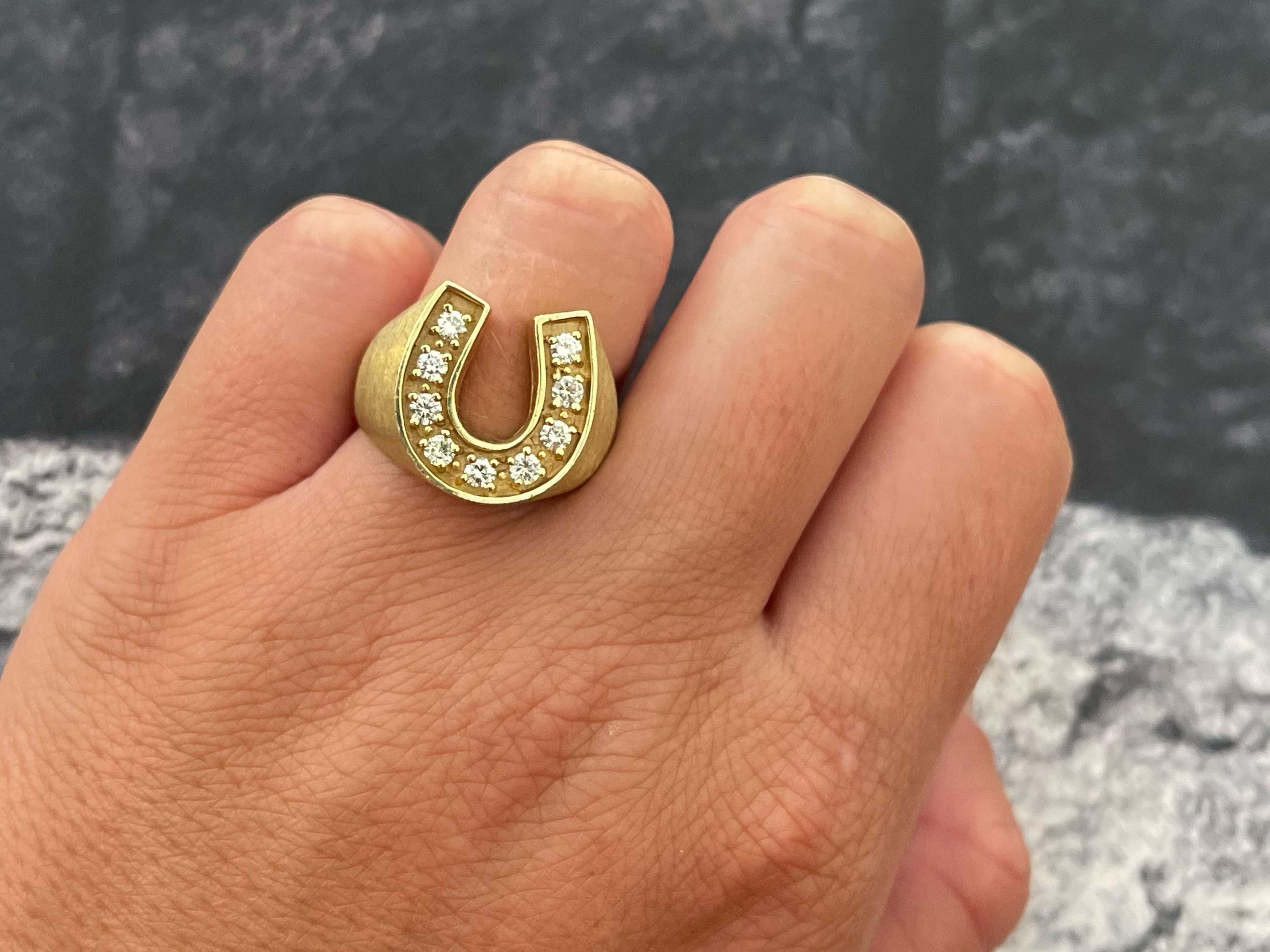 Item Specifications:

Metal: 14k Yellow Gold

Style: Statement Ring

Ring Size: 9 (resizing available for a fee)
​
​Ring Height: 17.16 mm

Total Weight: 10.3 Grams

Gemstone Specifications: 9 brilliant cut diamonds

Diamond Carat Weight: 0.50