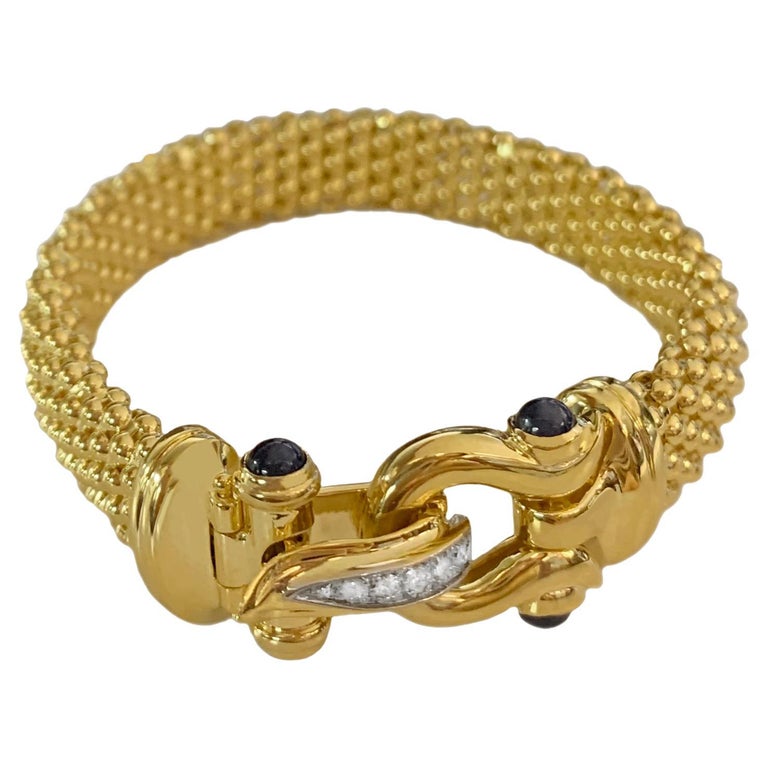 Horseshoe Bangle Bracelet in Yellow Gold Sapphires and Diamonds at 1stDibs