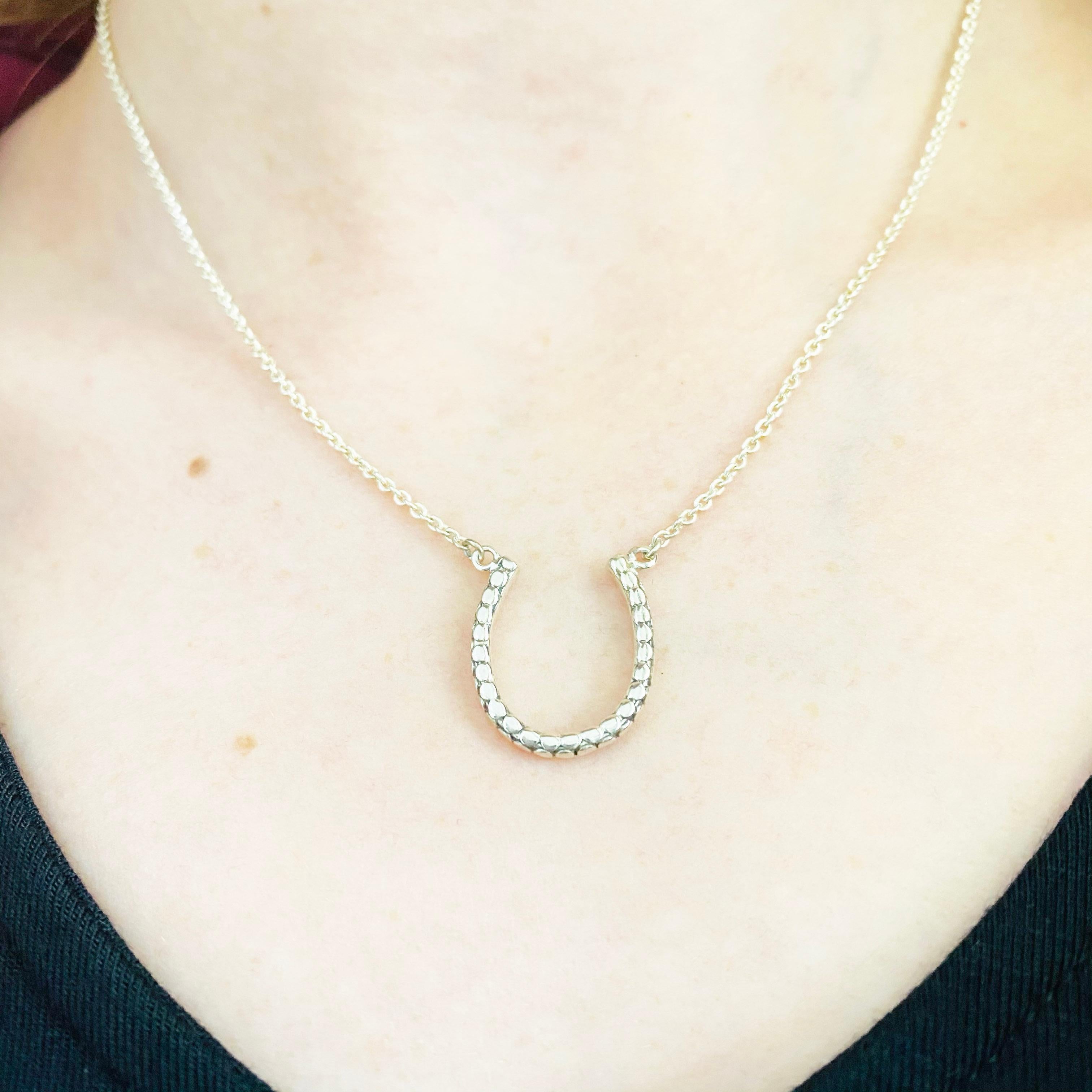 This gorgeous horseshoe pendant is a stunning and striking design. The horseshoe pendant is made in genuine 925 sterling silver and ready to catch a lifetime of good luck!  The metal is a unique, anti-tarnish sterling silver. This pendant is on a 16