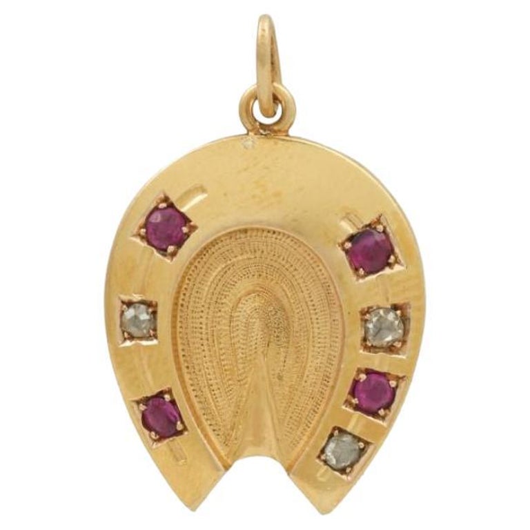 'Horseshoe' Pendant with 4 Rubies and 3 Diamonds For Sale