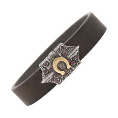 Horseshoe Ruby Yellow Gold Silver and Leather Bracelet