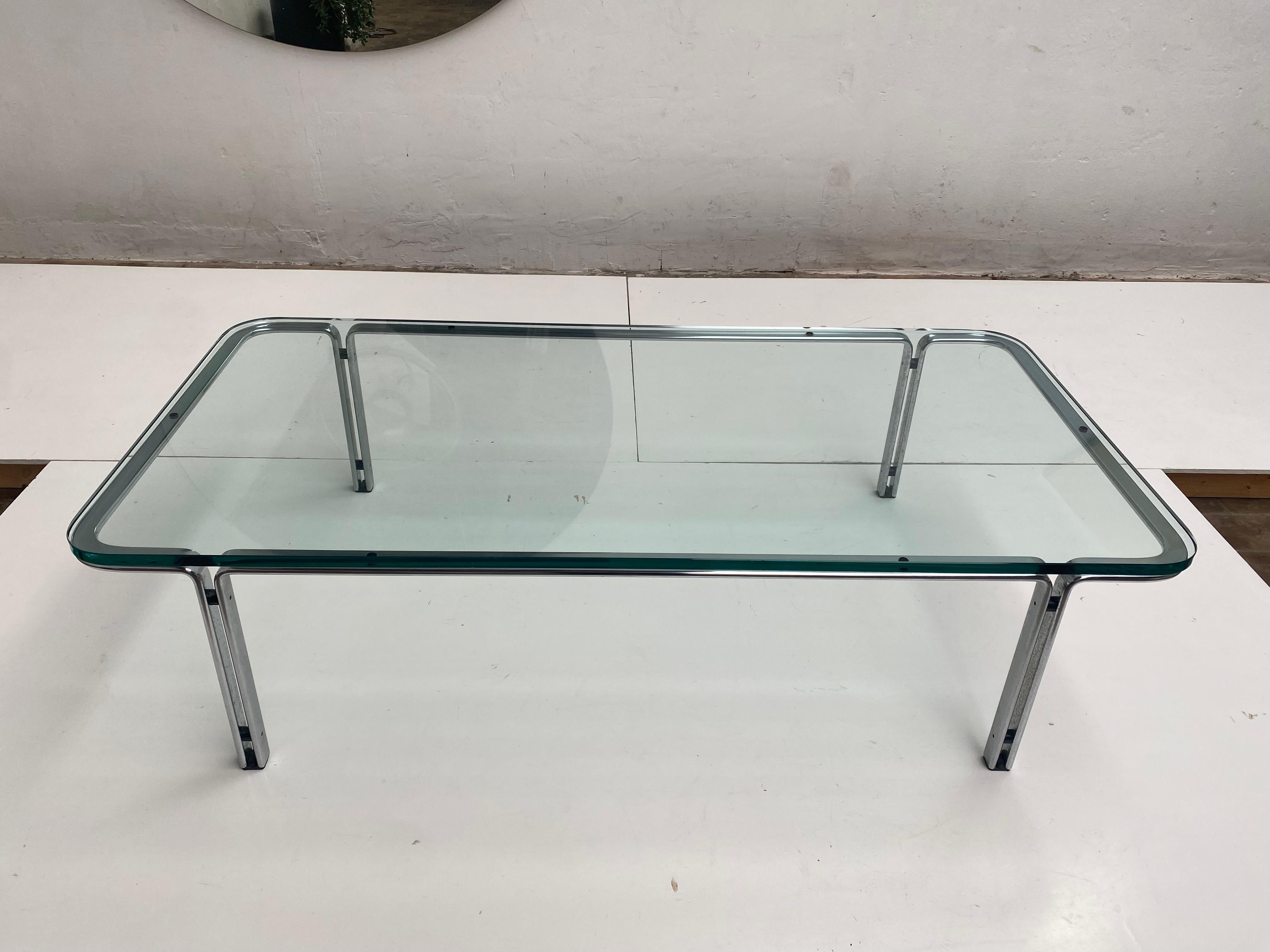 T112 Rectangular Coffee table by Horst Brüning for Alfred Kill International Circa 1970

Very nice original vintage condition, the glass has a few minuscule chips to the edge that are not visible 

Nice and honest example

The Nickel plated steel