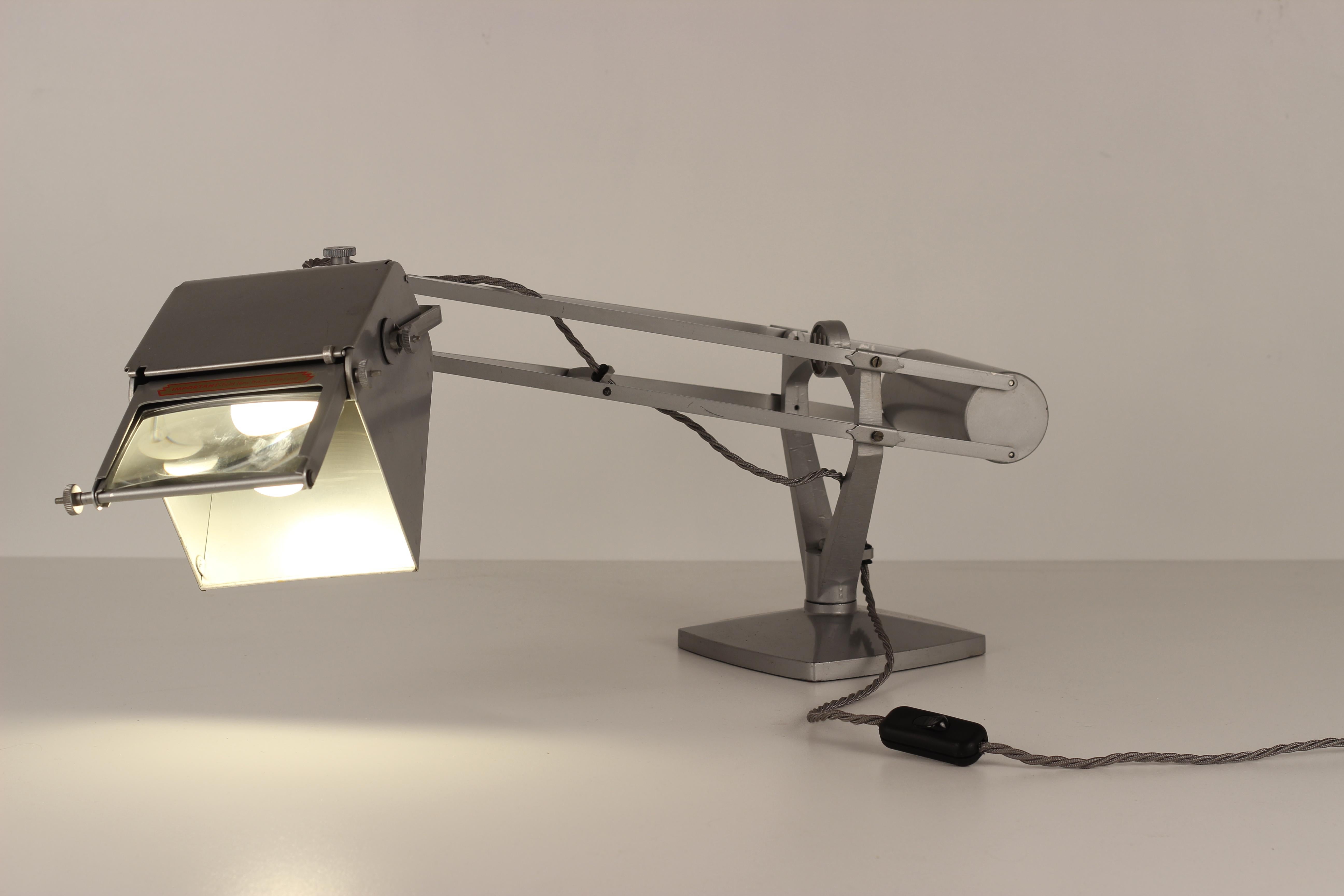 anglepoise magnifying lamp