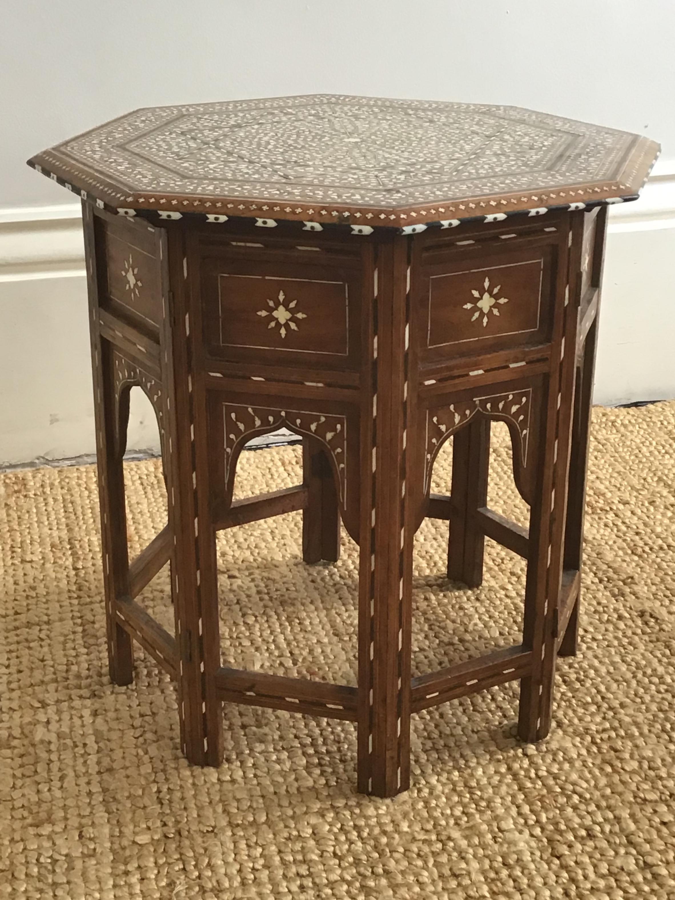 19th century Indian Hoshiarpur bone ebony and hardwood inset
Octagonal occasional table on conforming hinged Mihrab arcaded base
Although Turkish in inspiration octagonal tables of this form were made in several parts of the late 19 century