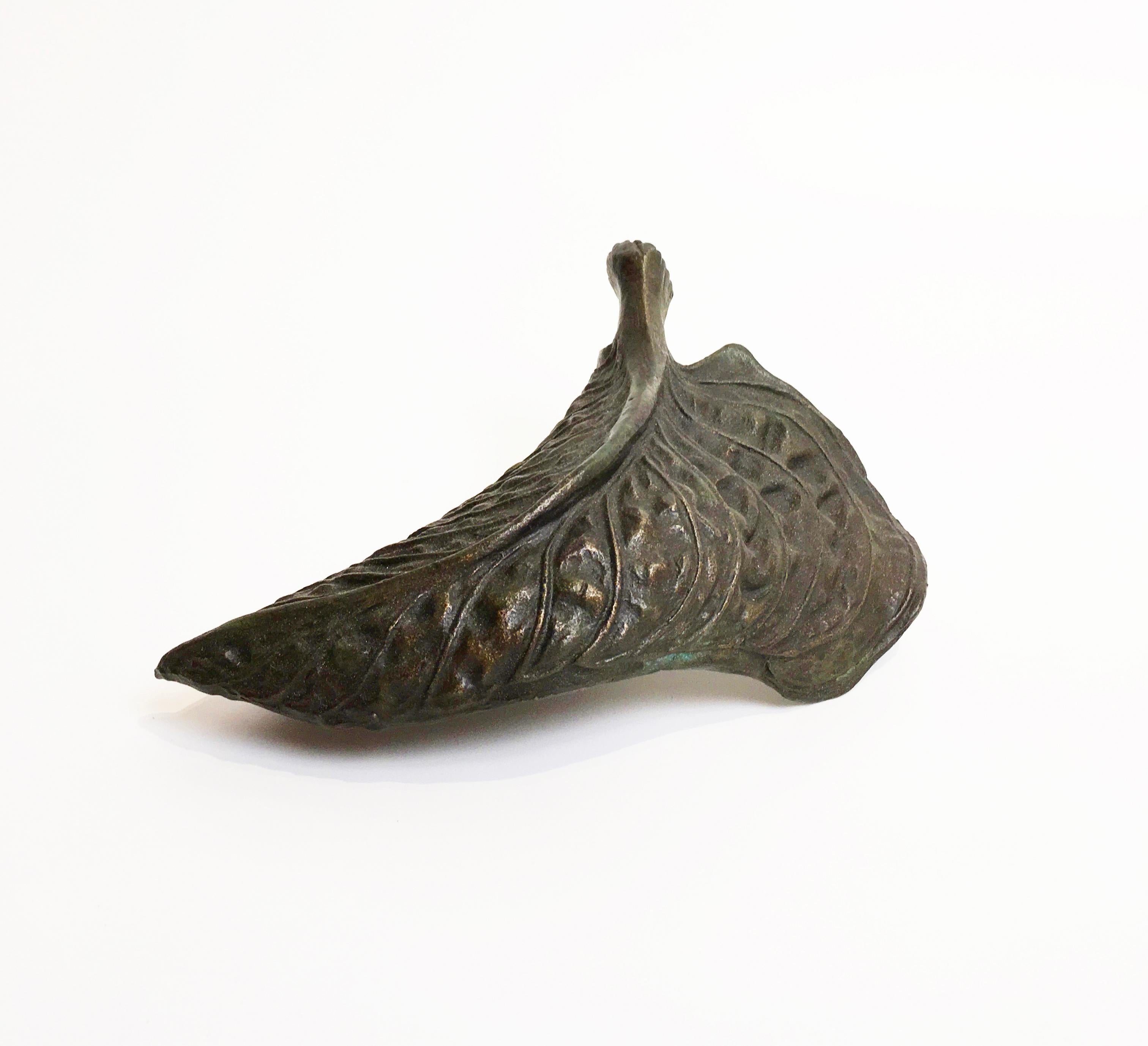 This small bronze sculpture is a maquette for a large scale sculpture at the Olbrich Gardens in Madison, Wisconsin. Made with the ancient lost wax method, a process dating back to the 3rd millennium BC, in which the hosta leaf is carved in wax then