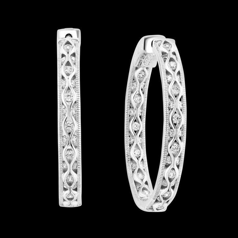 Hot Fashionable 1.2 Inch  Inside Out Hoops in Sterling Silver & Cubic Zirconia 

Hot Fashionable Medium 1.2 Inch wide  , Weight 8.5 gm , Inside Out Hoops in Sterling Silver And Cubic Zirconia 
Please read the review about his item from the customer