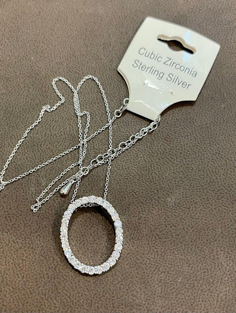 Hot Fashionable Circle Sterling Silver Pendant with Chain In Cubic Zirconia  In New Condition For Sale In New York, NY