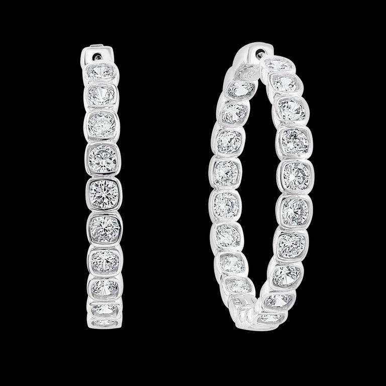 Hot Fashionable  Inside Out Hoops in Sterling Silver & Big Size Cubic Zirconia 
Hot Fashionable Medium 1.5 Inch  wide  , Weight 16.6 gm , Inside Out Hoops in Sterling Silver And Cubic Zirconia 
Please read the review about his item from the customer