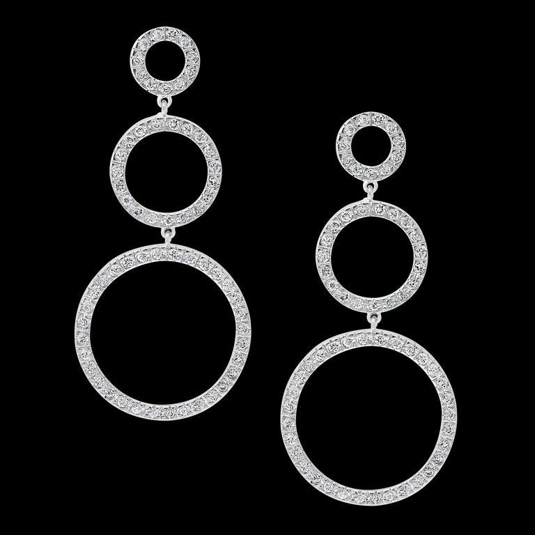 Hot Fashionable  Long  Dangling Three Circle Sterling Silver Earrings
Hot Fashionable  Long  Dangling Three Circle Sterling Silver Earrings  in Cubic Zirconia 
Please read the review about his item from the customer who purchased it from me.
Cubic
