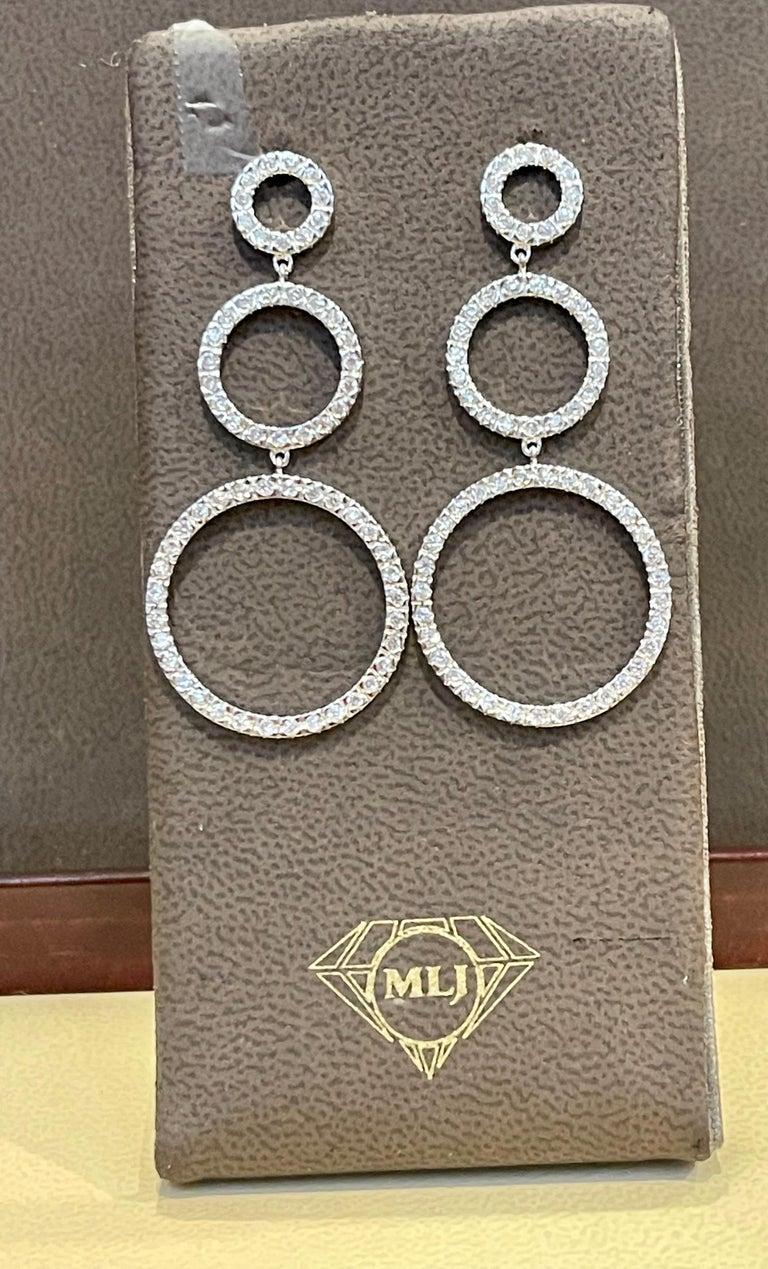 Hot Fashionable  Long  Dangling Three Circle Sterling Silver Earrings In New Condition For Sale In New York, NY