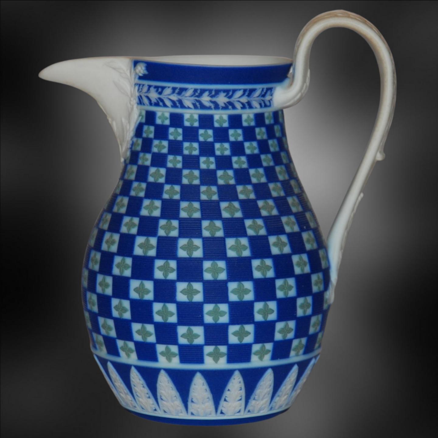 Superb and exceptionally rare small jug in tricolour engine-turned diceware.

This is very early jasperware, made when 