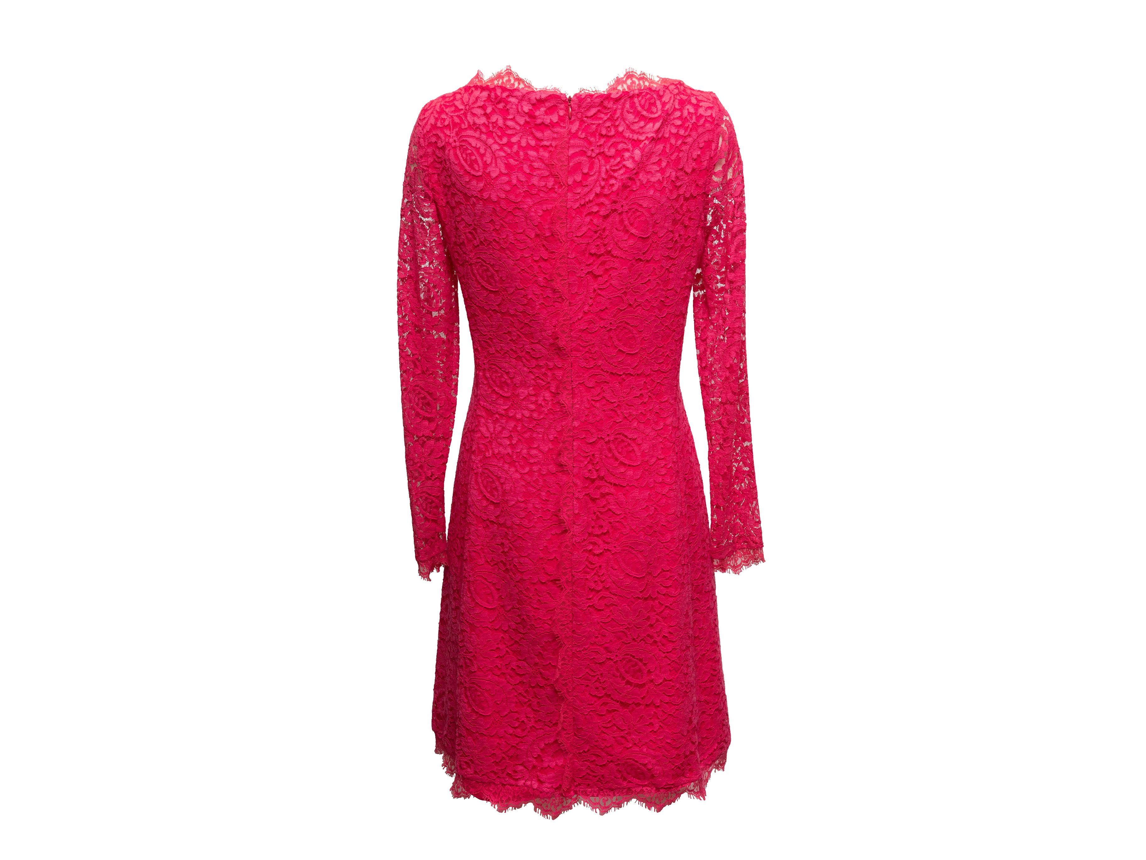 Hot pink lace long sleeve dress by Blumarine. Round neckline. Zip closure at back. 32