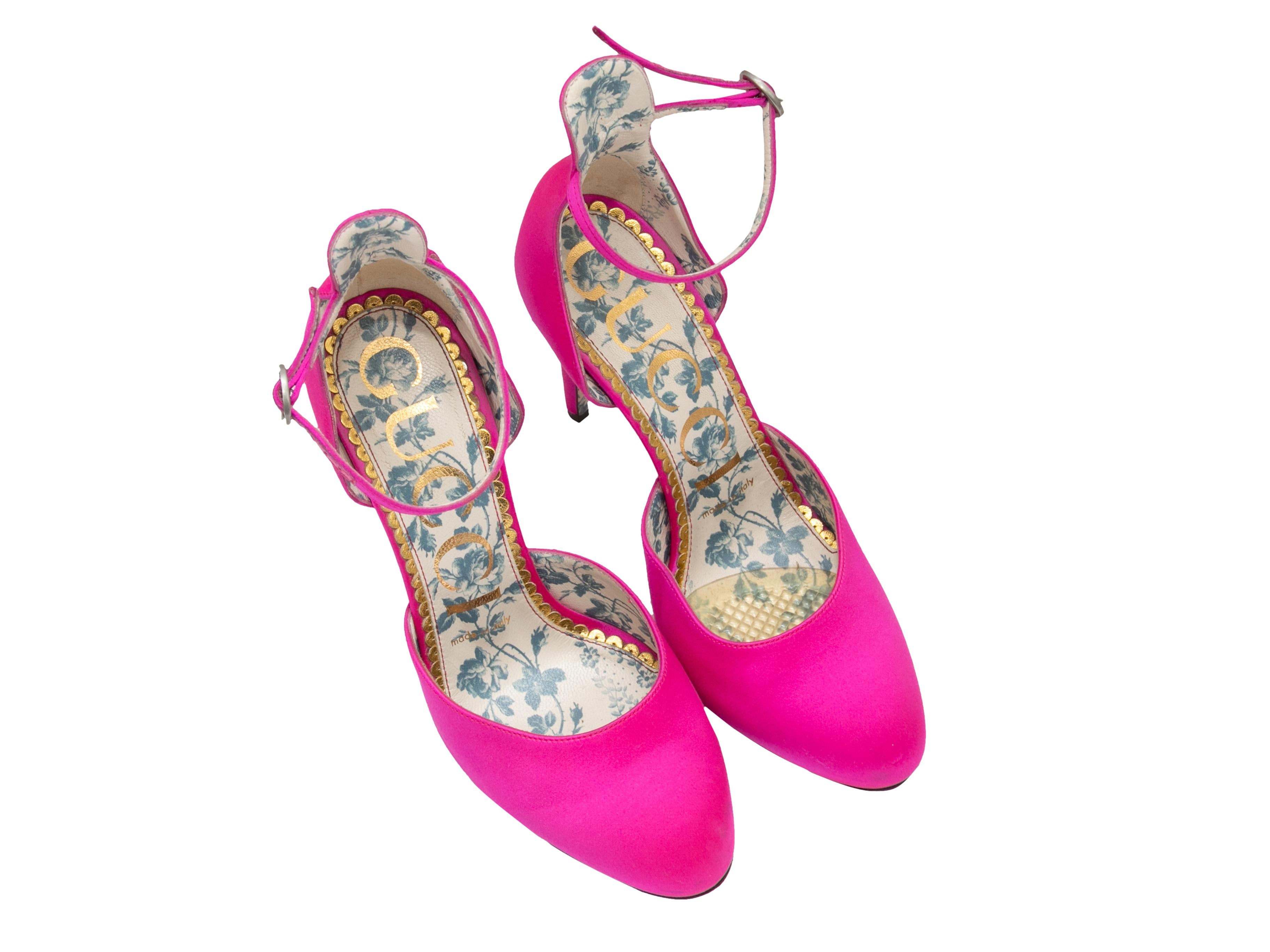 Hot pink satin pumps by Gucci. Crystal-embellished buckle closures at ankle straps. 4