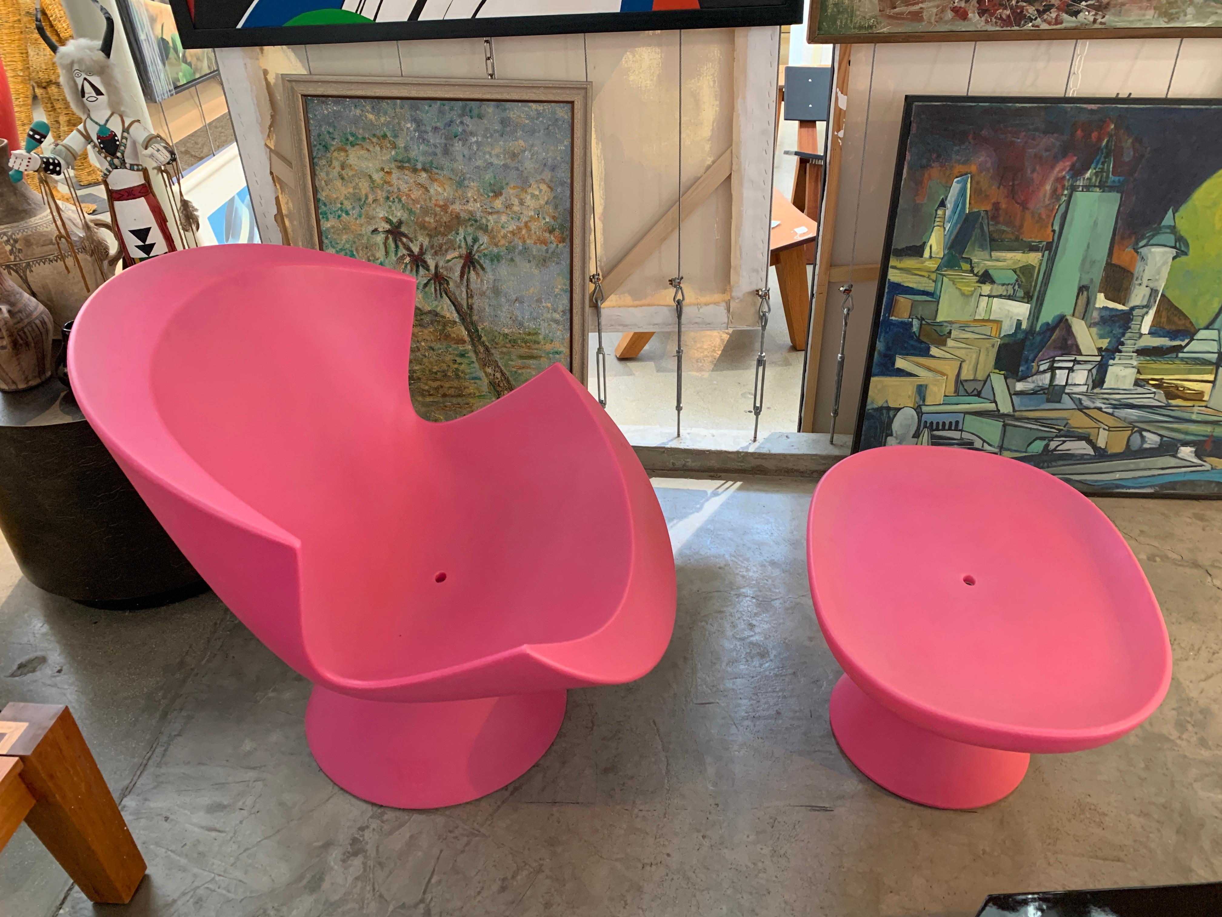 Karim Rashid designed this Kite chair and Mini Kite ottoman for Label of the Netherlands in 2004. They were sold I believe through DWR and are no longer in production. As Karim Rashid's fame has grown internationally these chairs have become sought