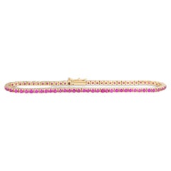 Bracelet tennis en or jaune 14 carats avec saphir rose vif