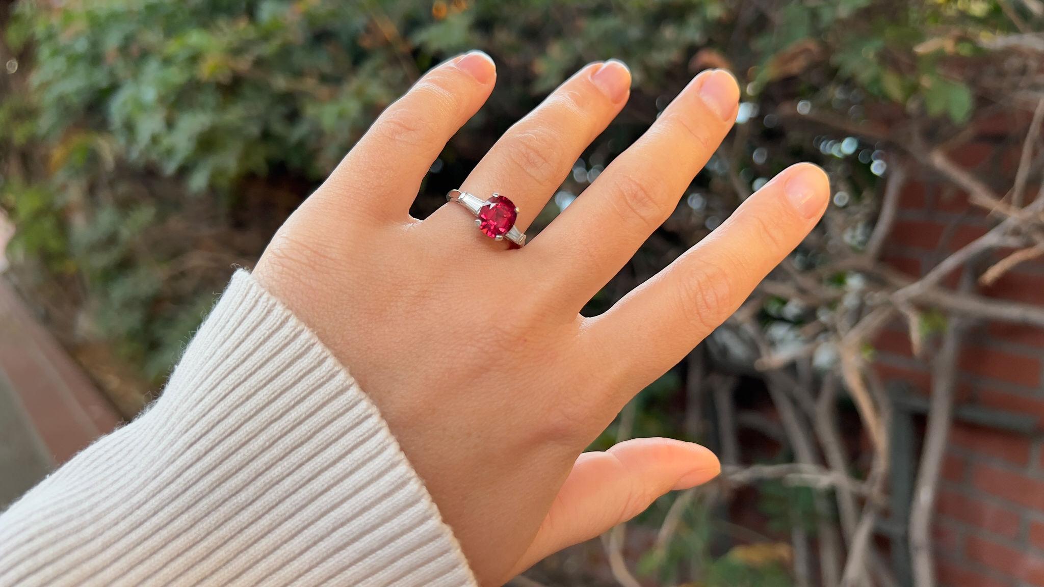 Hot Pink Spinel = 2.80 Carat
(Cut: Oval, Color: Pink, Origin: Natural)
Diamond = 0.28 Carats
(Cut: Tapered Baguette, Color: F, Clarity: VS)
Metal = Platinum
Ring Size = 6