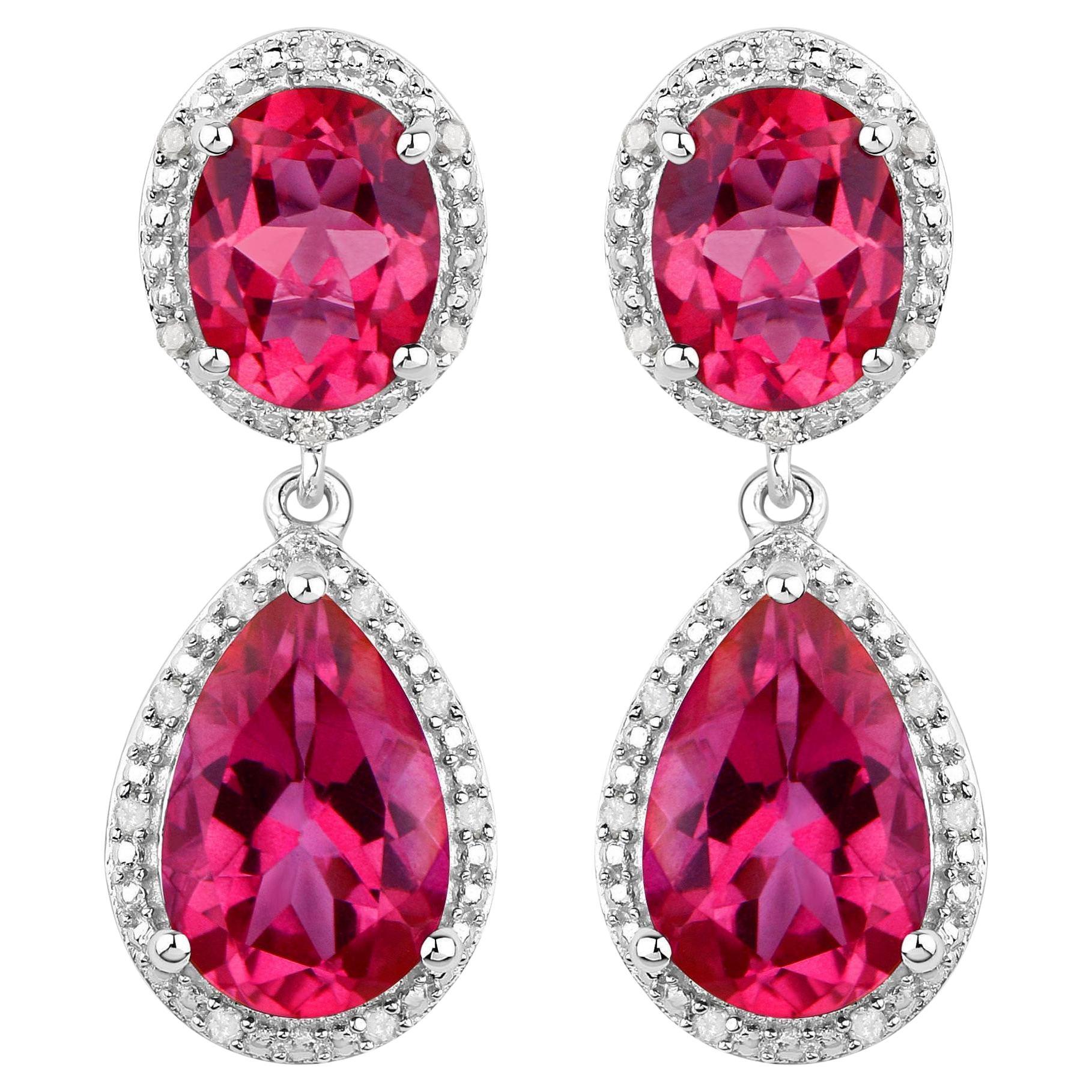 It comes with the appraisal by GIA GG/AJP
All Gemstones are Natural 
Hot Pink Topaz = 11.20 Carats
Diamonds = 0.15 Carats
Metal: Rhodium Plated Silver
Length: 30 mm