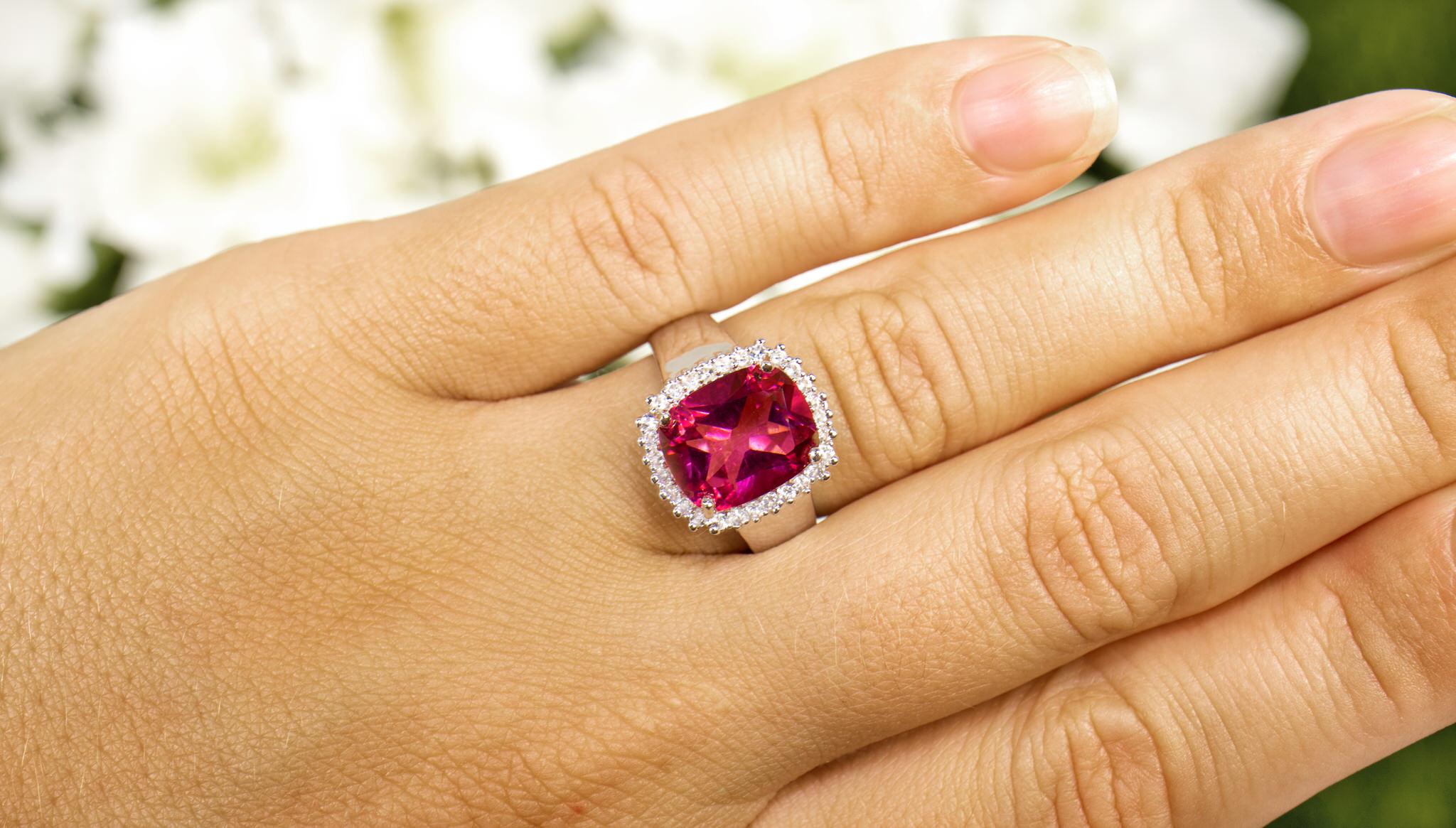 It comes with the Gemological Appraisal by GIA GG/AJP
All Gemstones are Natural
Hot Pink Topaz = 4.12 Carats
28 White Topazes = 0.28 Carats
Metal: Rhodium Plated Sterling Silver
Ring Size: 7* US
*It can be resized complimentary
