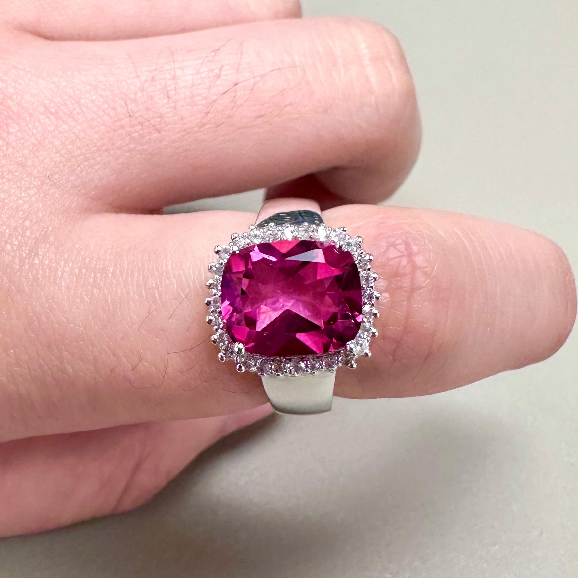 It comes with the Gemological Appraisal by GIA GG/AJP
All Gemstones are Natural
Hot Pink Topaz = 4.12 Carats
28 White Topazes = 0.28 Carats
Metal: Rhodium Plated Sterling Silver
Ring Size: 7* US
*It can be resized complimentary