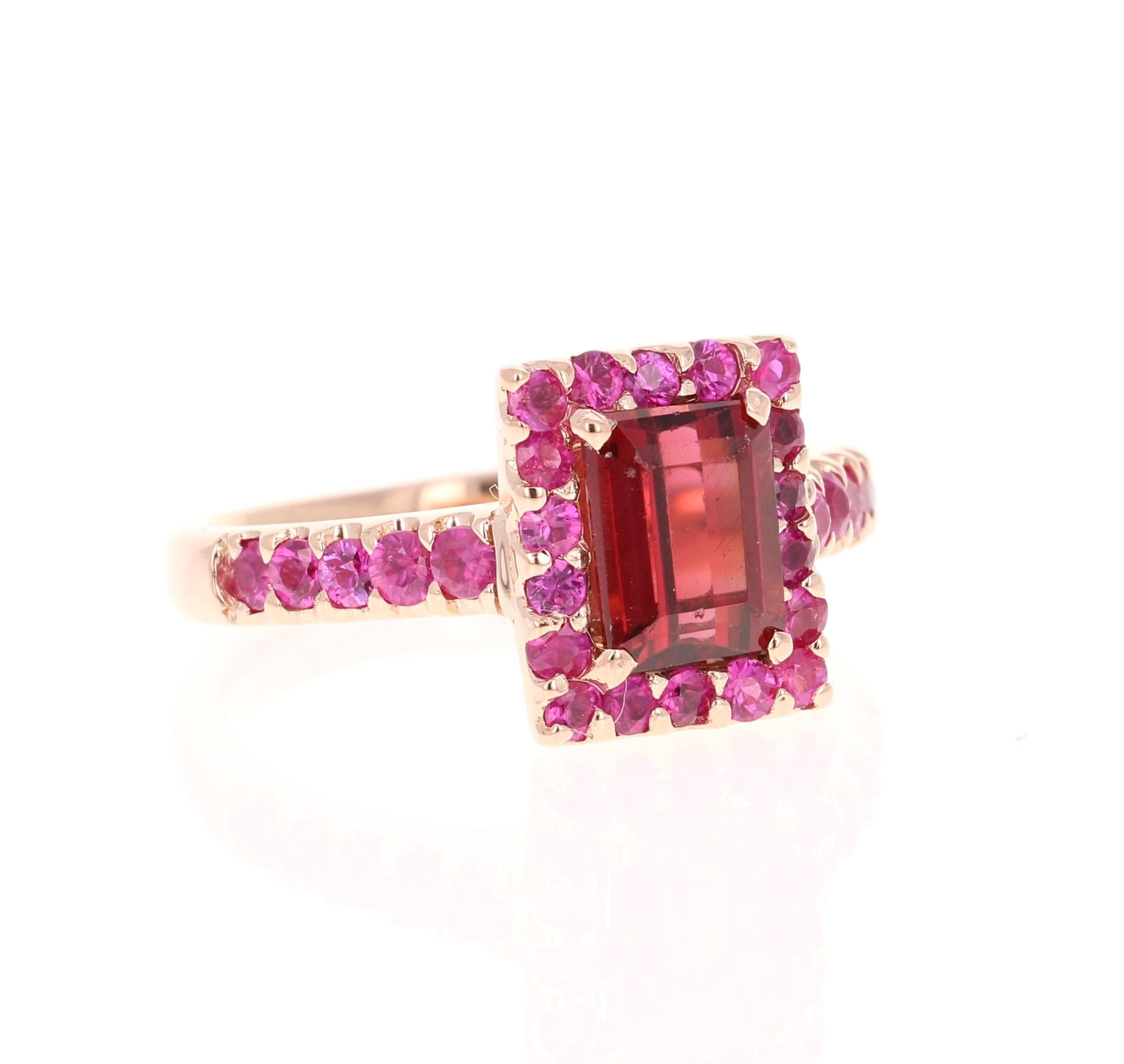 This ring has a Emerald Cut Hot Pink Tourmaline that weighs 2.08 Carats. Floating around the tourmaline are 28 Pink Sapphires that weigh 1.06 Carats. 
The total carat weight of the ring is 3.14 Carats. 
The Emerald Cut Tourmaline measures at 6 mm x