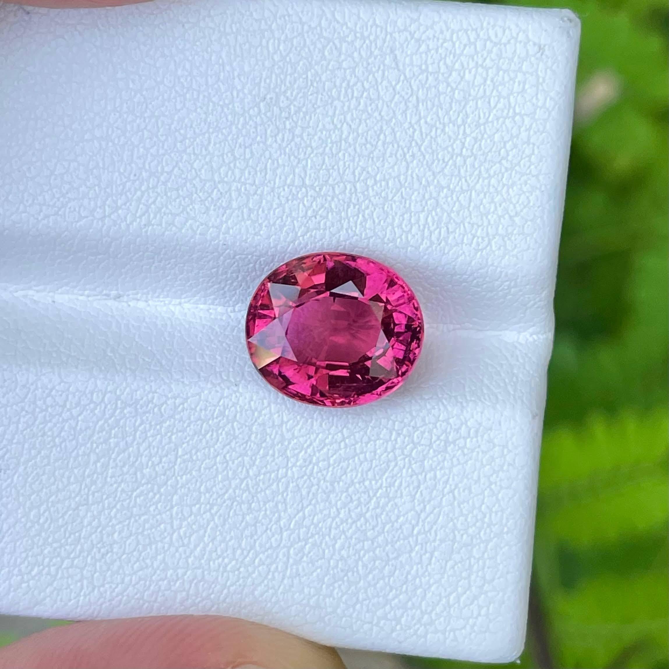 Weight 4.80 carats 
Dimensions 11.21x9.71x6.57 mm
Treatment none 
Origin Nigeria 
Clarity VVS (Very, Very Slightly Included)
Shape Oval 
Cut Oval Faceted 




The Hot Pink Tourmaline Stone, a captivating gem originating from Nigeria, boasts a