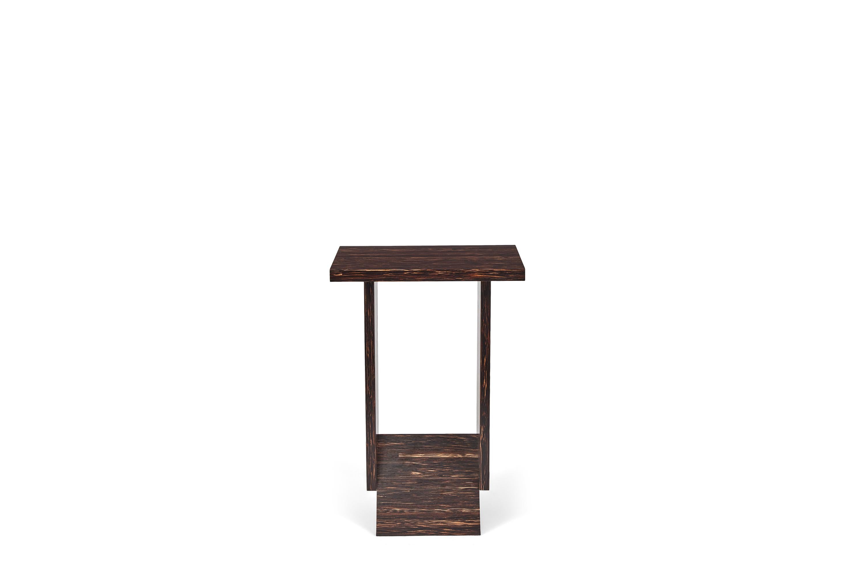 'Hotel de Tour' Palm Wood Side Table in the Manner of Pierre Chareau

Handcrafted in the Los Angeles and French workshops of noted French designer and antiques dealer Denis de le Mesiere, who meticulously pays homage to the work of Pierre Chareau