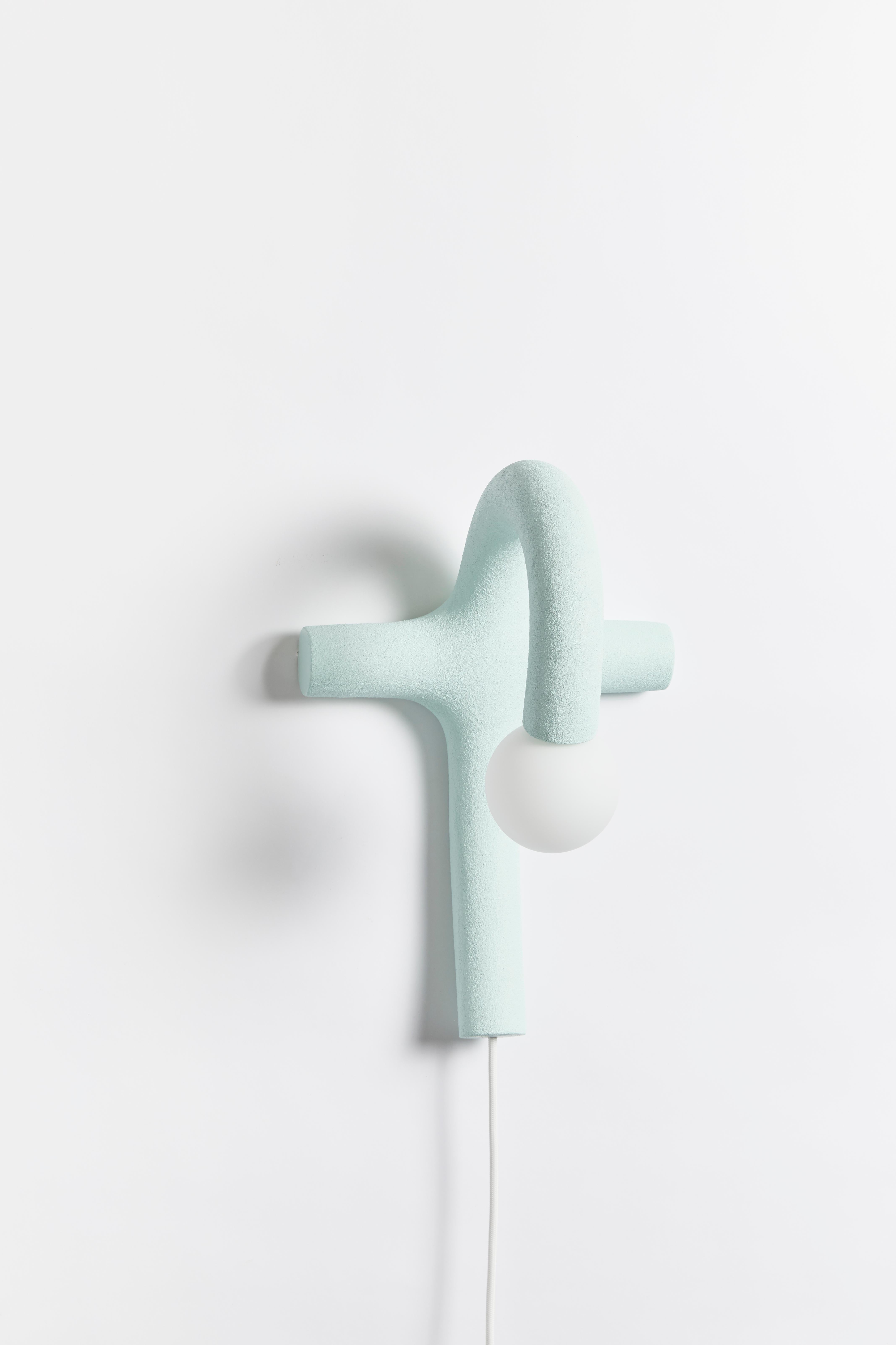 Hotel light 06 wall lamp by HWE
Limited edition
Materials: Waste SLS 3D nylon powder, sand from sustainable sources
Dimensions: H 40 x W 27 x D 23 cm 
Colour: aqua
Also available in: pink, cream, lemon, anthracite and grey

All our lamps can