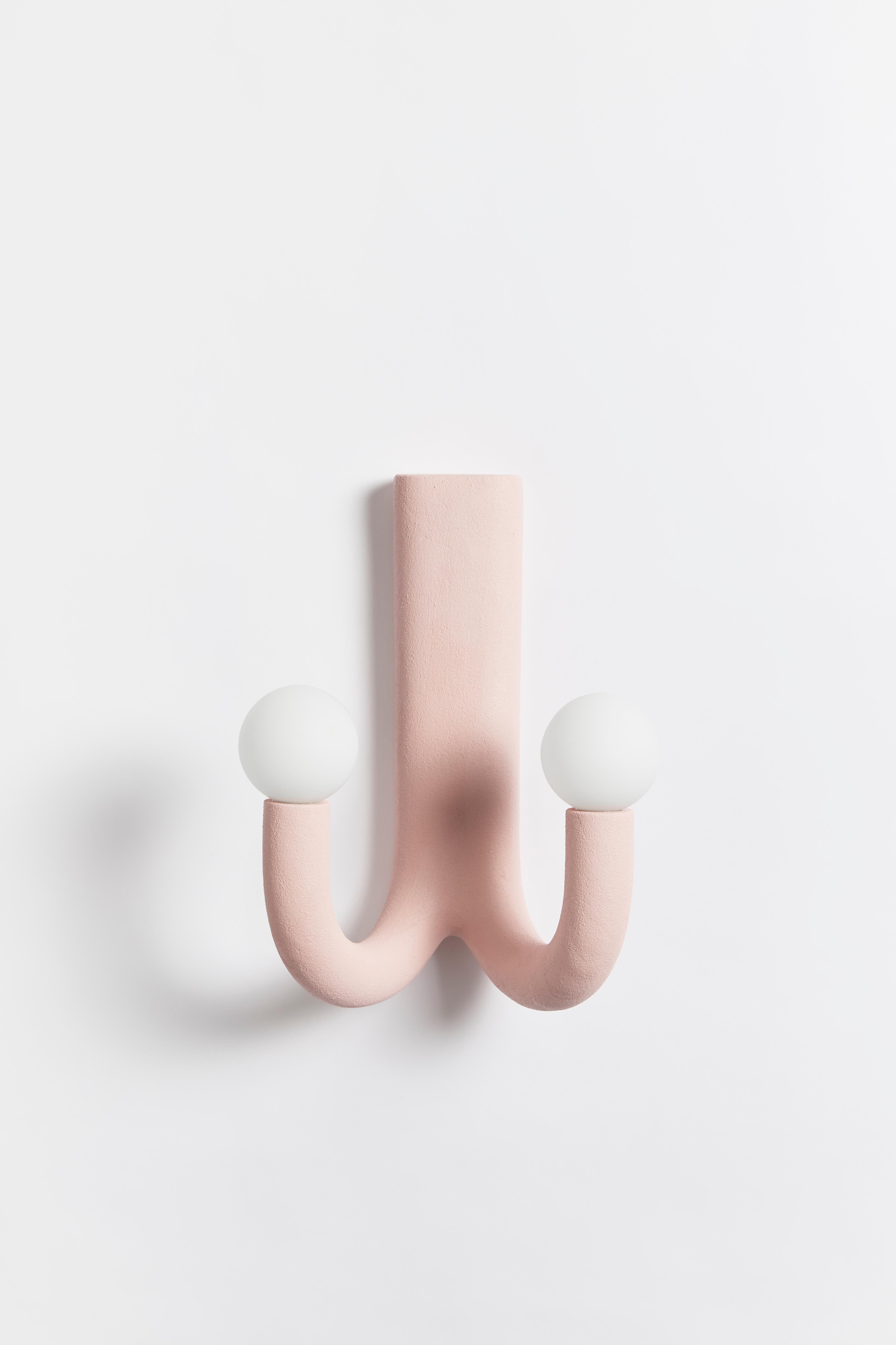Hotel light 08 wall lamp by HWE
Limited Edition
Materials: Waste SLS 3D nylon powder, sand from sustainable sources
Dimensions:  H 39 x W 22 x L 32 cm
Colour: pink
Also available in: aqua, cream, lemon, anthracite and grey

All our lamps can be