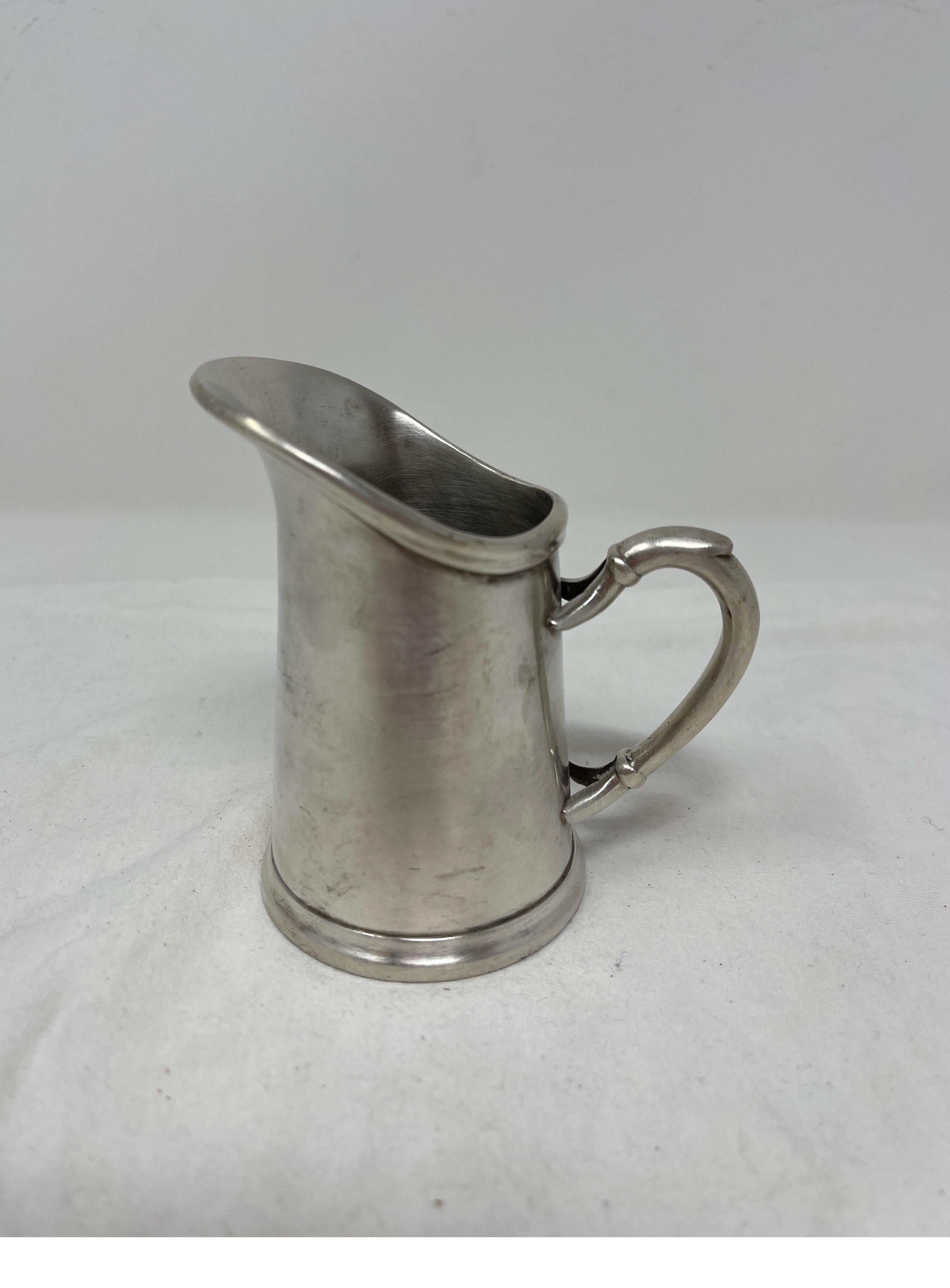 Enjoy your coffee or tea with this adorable little 19th century Hotel Silver creamer. Elevate your morning routine or use this pitcher to old pens, pencils or a fresh cut flower.