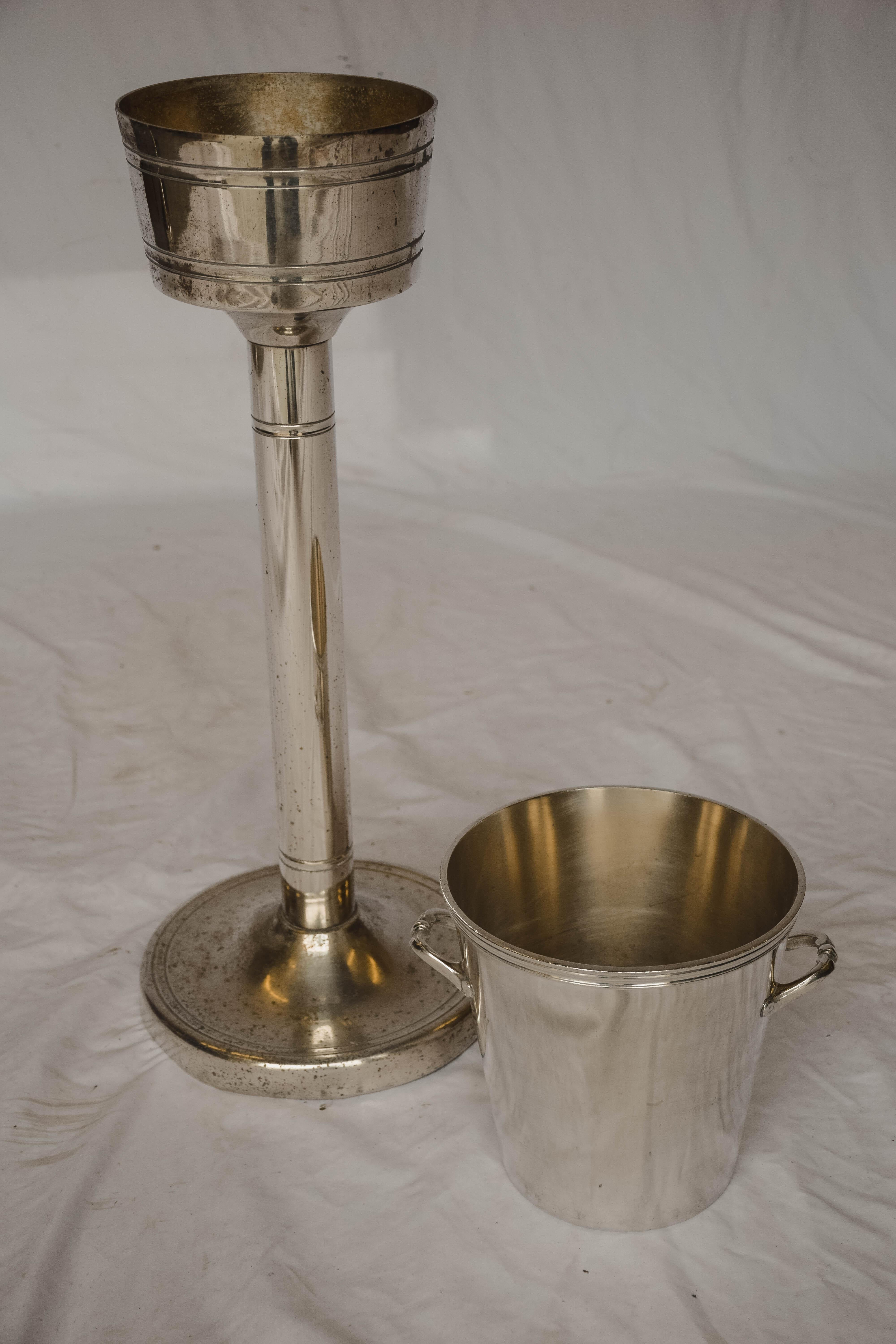 Hotel silver French Champagne bucket with stand from the Lyon region of France. Most likely used in a restaurant or hotel. The bucket itself is easily removed from the stand as seen in the photos.