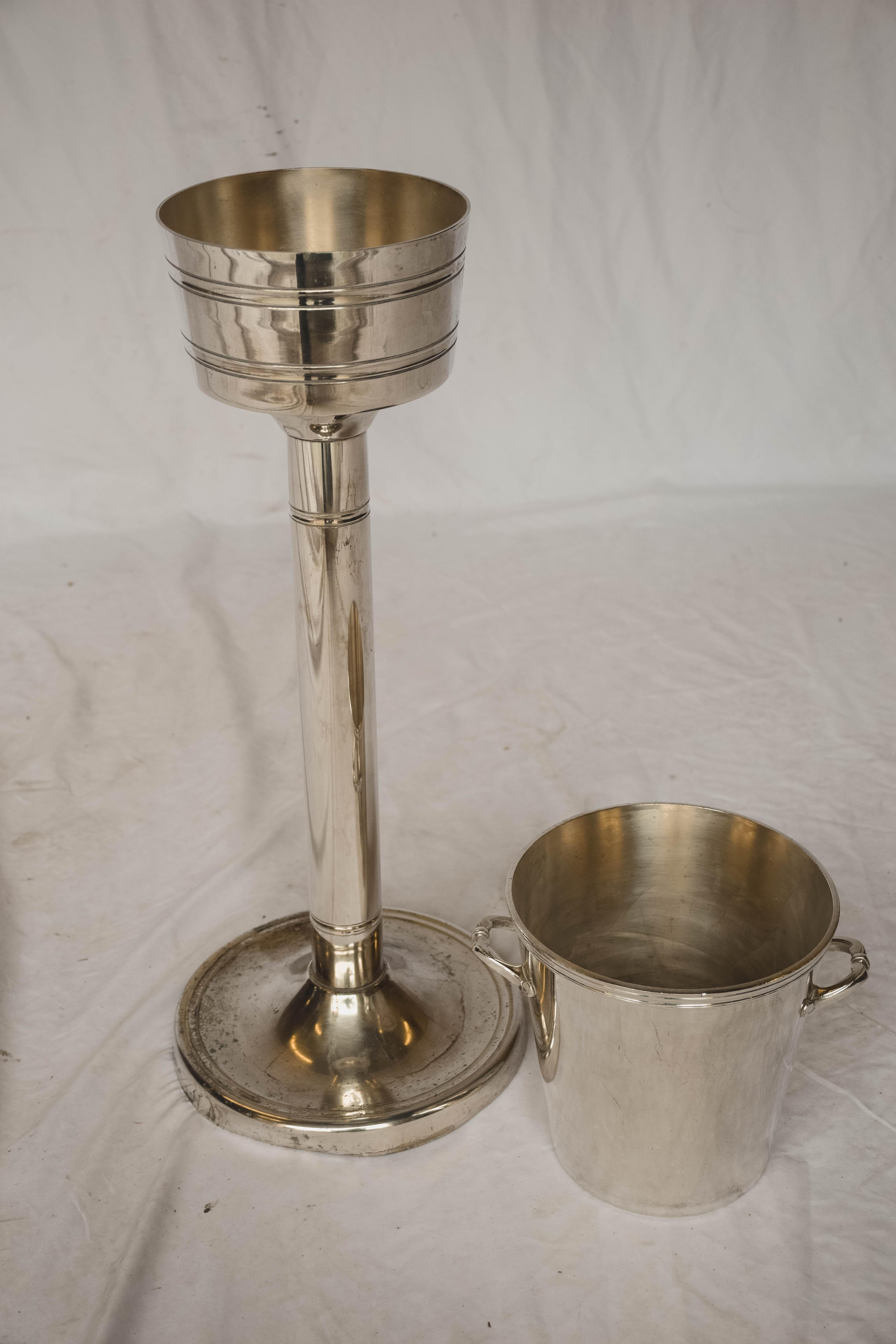 Hotel silver French champagne bucket with stand from the Lyon region of France. Most likely used in a restaurant or hotel. The bucket itself is easily removed from the stand as seen in the photos.