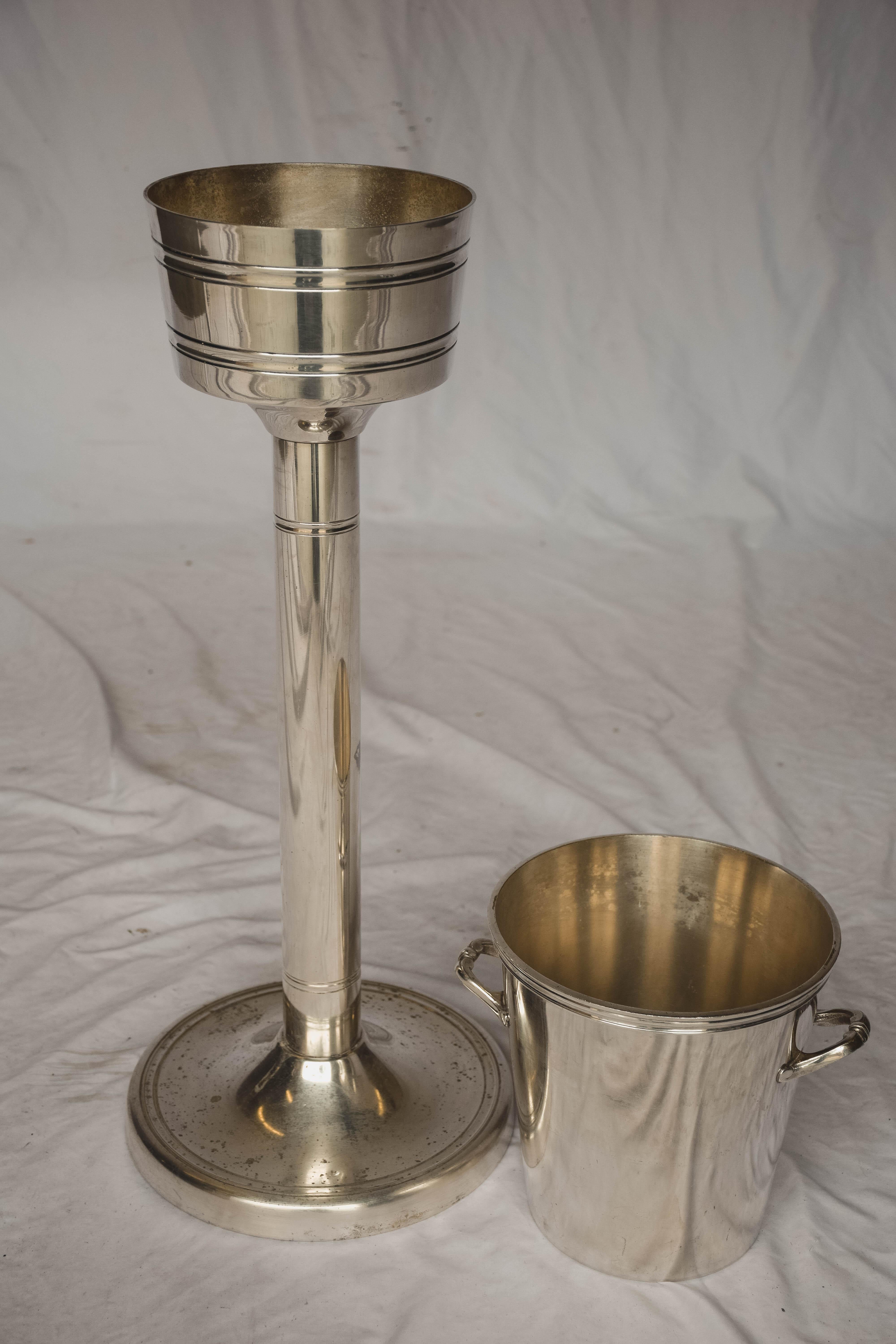 Hotel silver French Champagne bucket with stand from the Lyon region of France. Most likely used in a restaurant or hotel. The bucket itself is easily removed from the stand as seen in the photos.