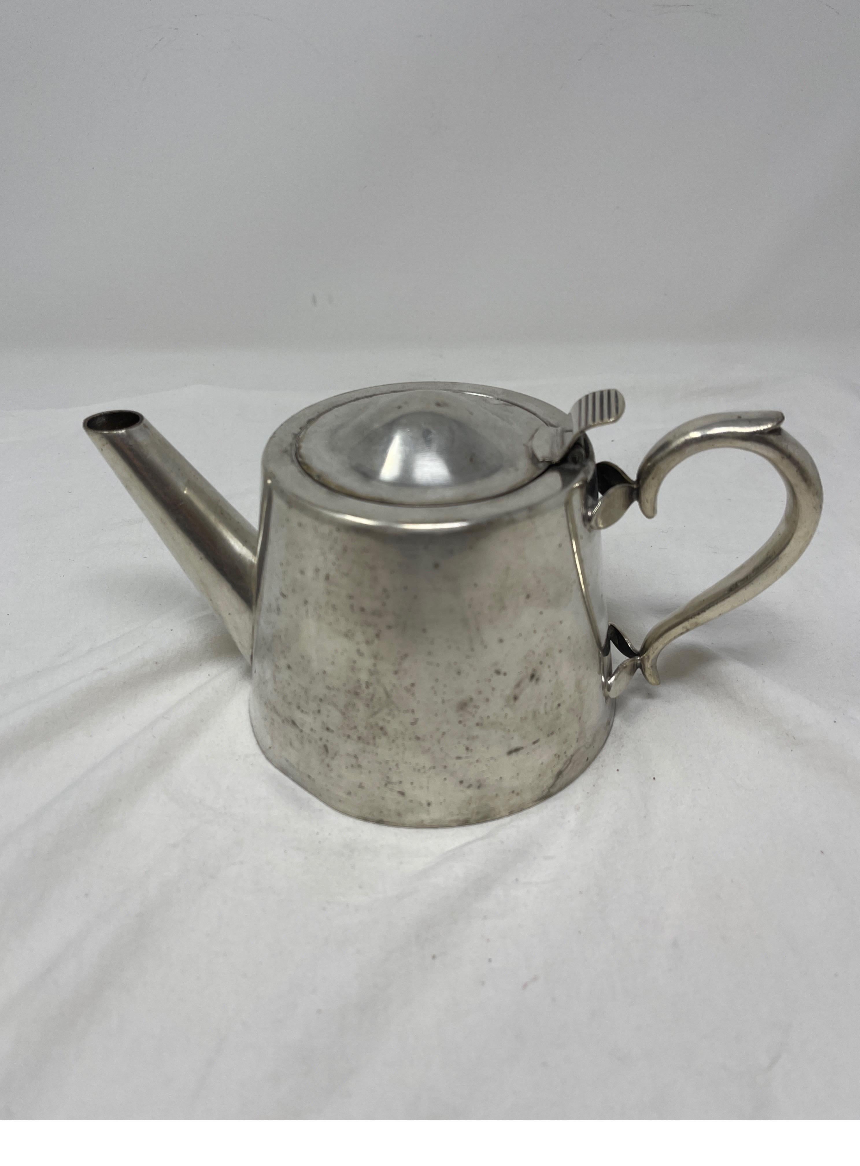 Enjoy this charming 19th century tea pot from France while entertaining or enjoying a cup of tea for yourself. 
Measures: 4
