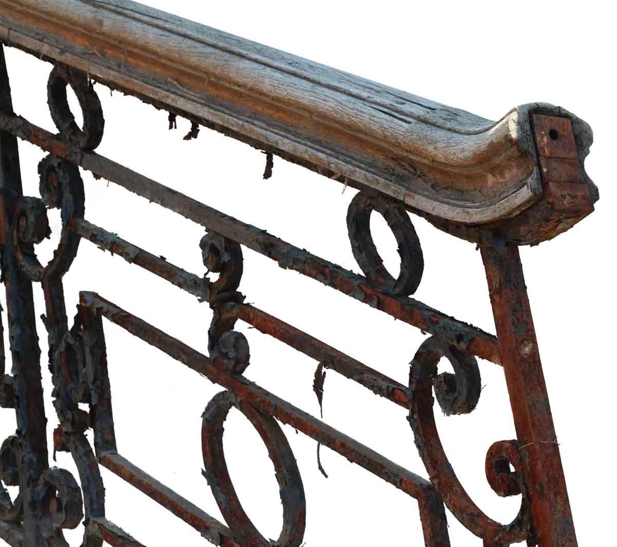 1900s heavy wrought iron ornate Victorian stair railing with several landing pieces. There are eleven runs of the stair railing in the lengths listed below and seven balcony landing railings in the sizes listed below. The total linear footage is 100
