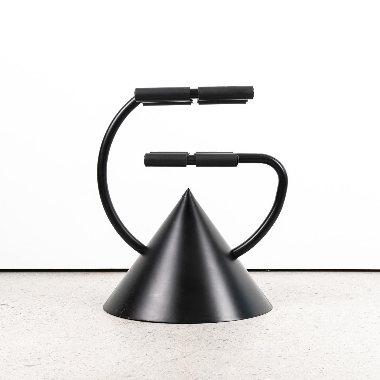 The Hotel Zeus TV stand is a design of Ron Arad. It was manufactured by Zeus Noto in Italy in 1992.
The stand is constructed of enameled steel. 
The prongs of the platform are wrapped in soft foam, while the conical base hides caster wheels for easy
