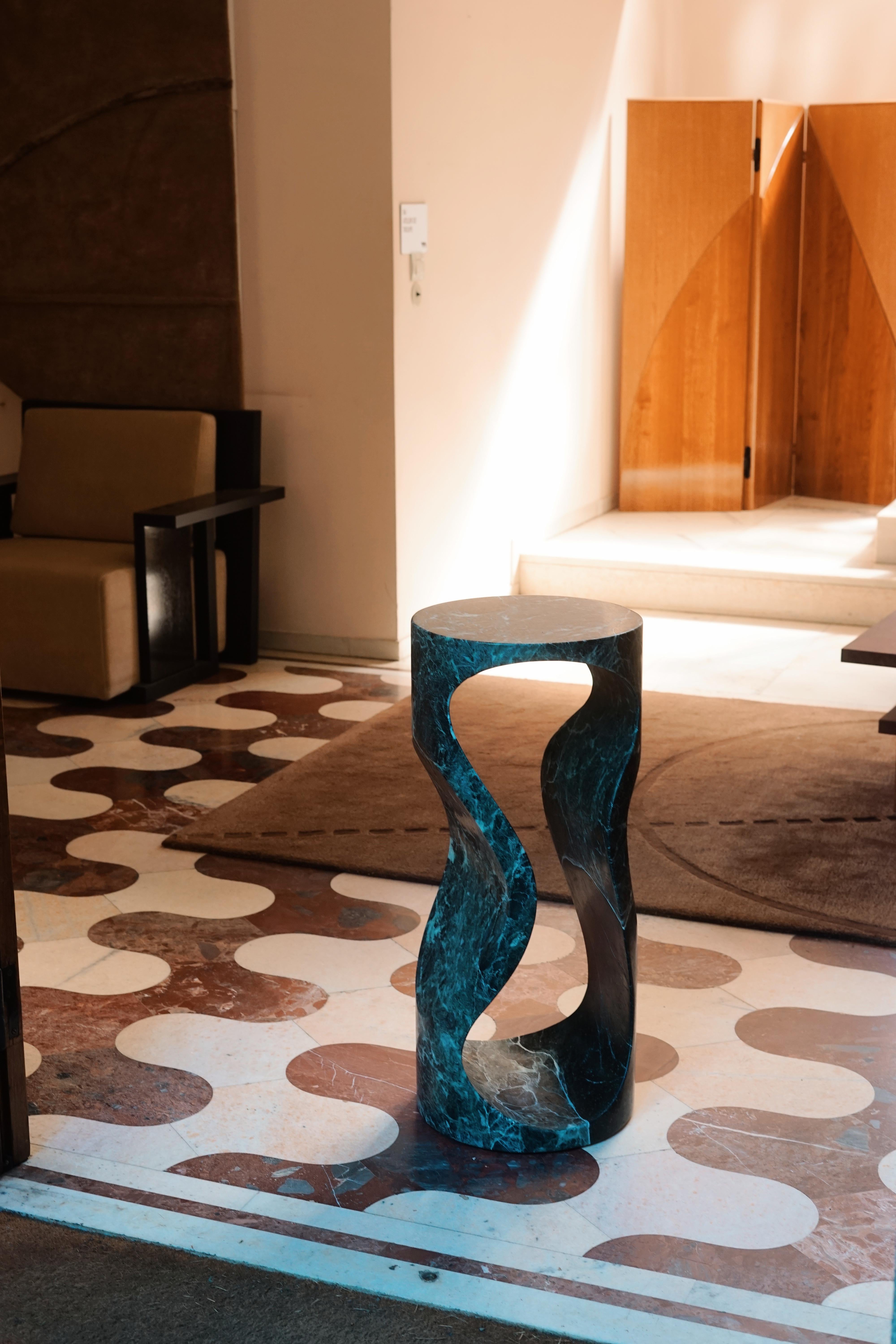 Hourglass Alpi Verde Marble Pedestal by Studio TOOJ
Designed by Johan Wilén
Dimensions: D 35 x H 80 cm.
Materials: Alpi Verde marble.

Introducing 