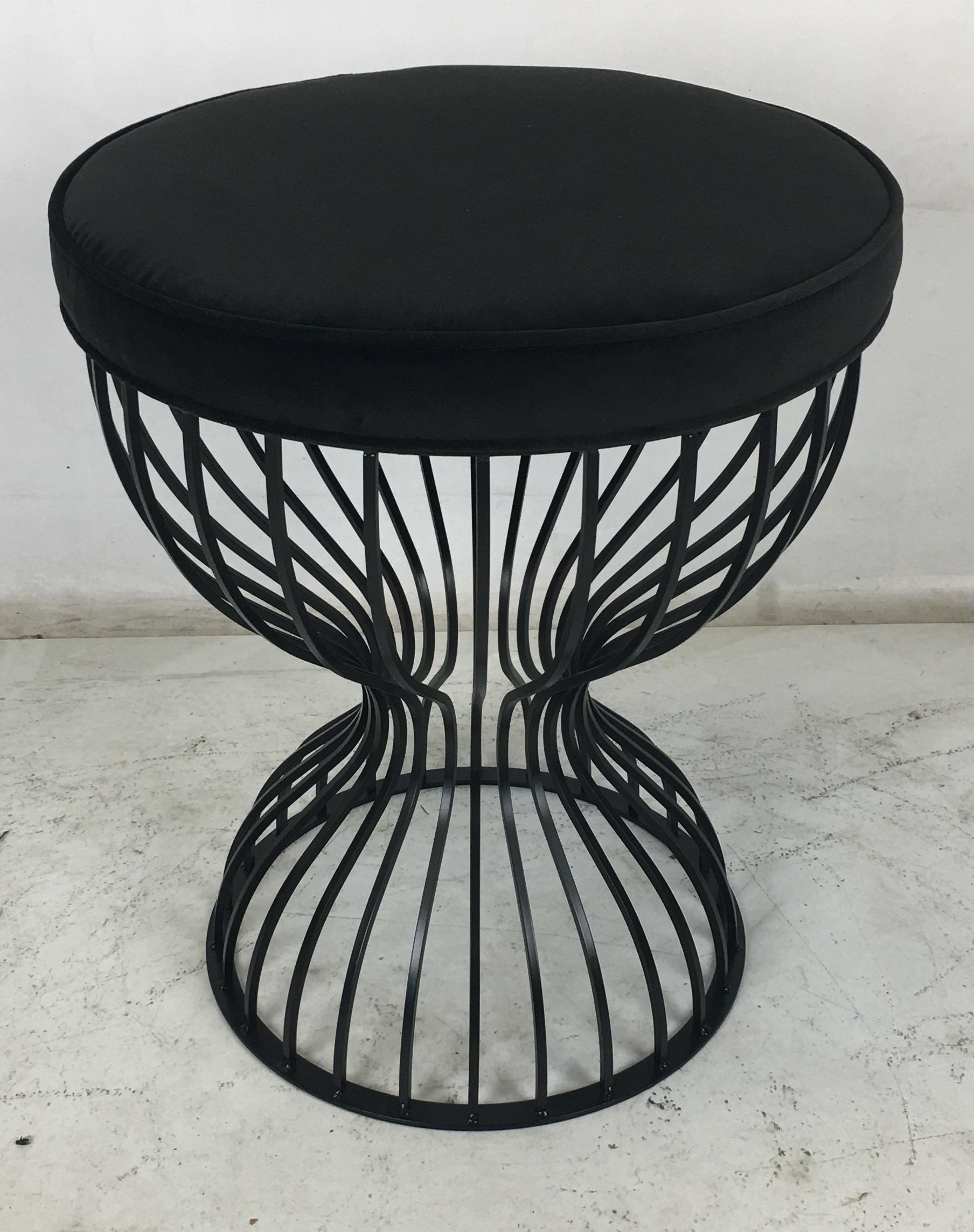 Steel hourglass cage form vanity or task stool with luxurious velvet seat.