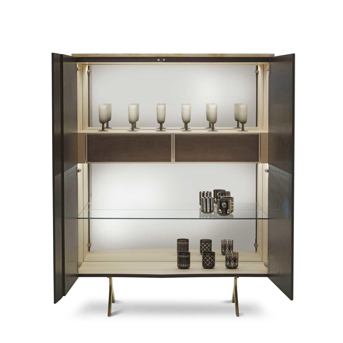 This magnificent bar cabinet is a superb object of functional decor that will provide display and storage area for glassware and accessories, while also being a stunning decorative accent in a modern or classic interior. Its structure in ash with a