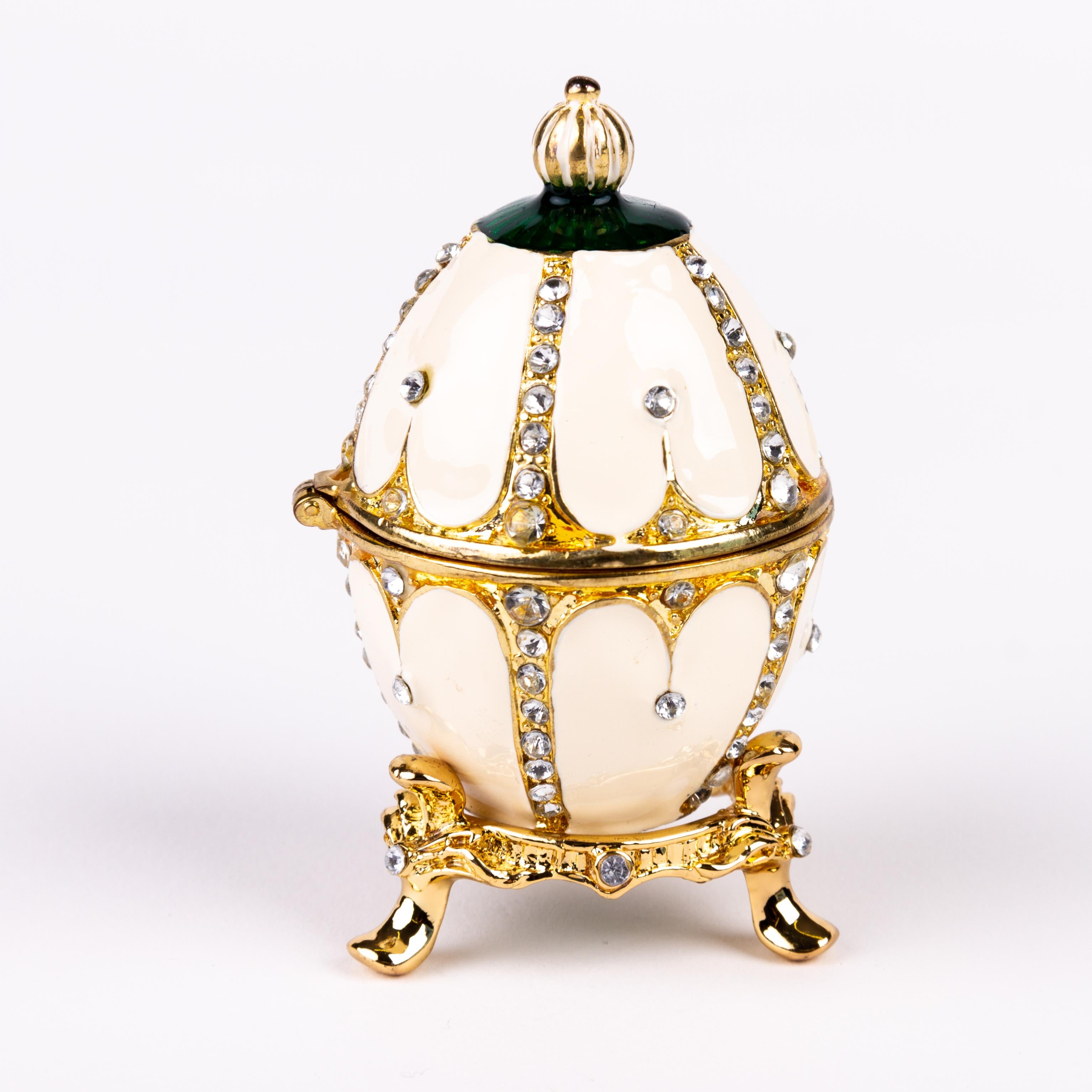 House of Faberge Enamel Egg on Gilded Stand 

We ship internationally. 

